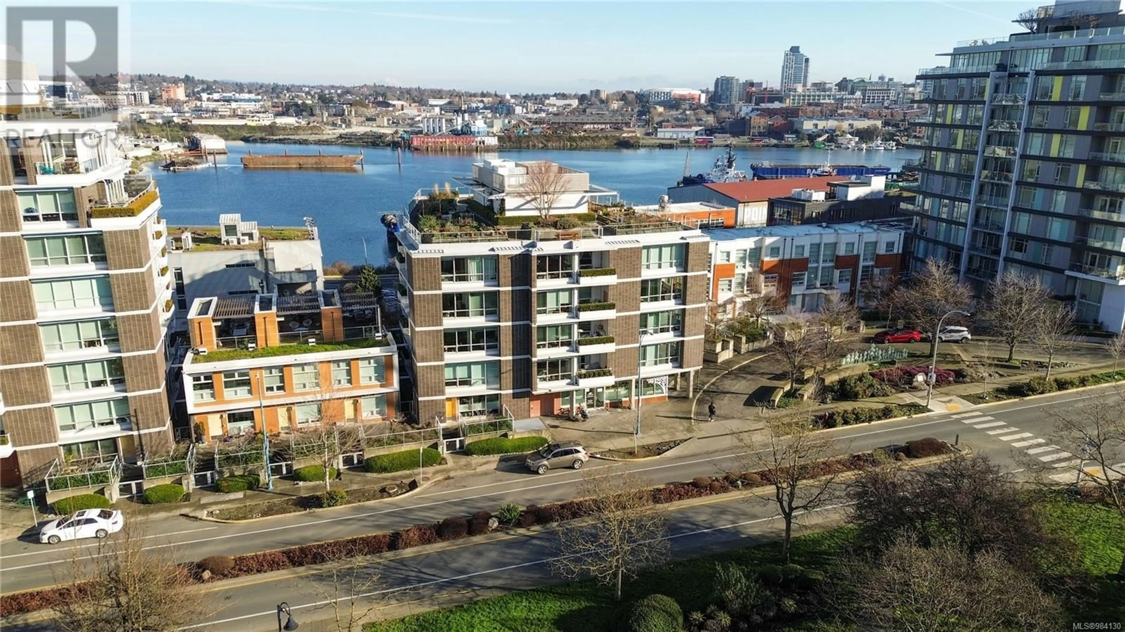 A pic from outside/outdoor area/front of a property/back of a property/a pic from drone, city buildings view from balcony for 304 391 Tyee Rd, Victoria British Columbia V9A0A9