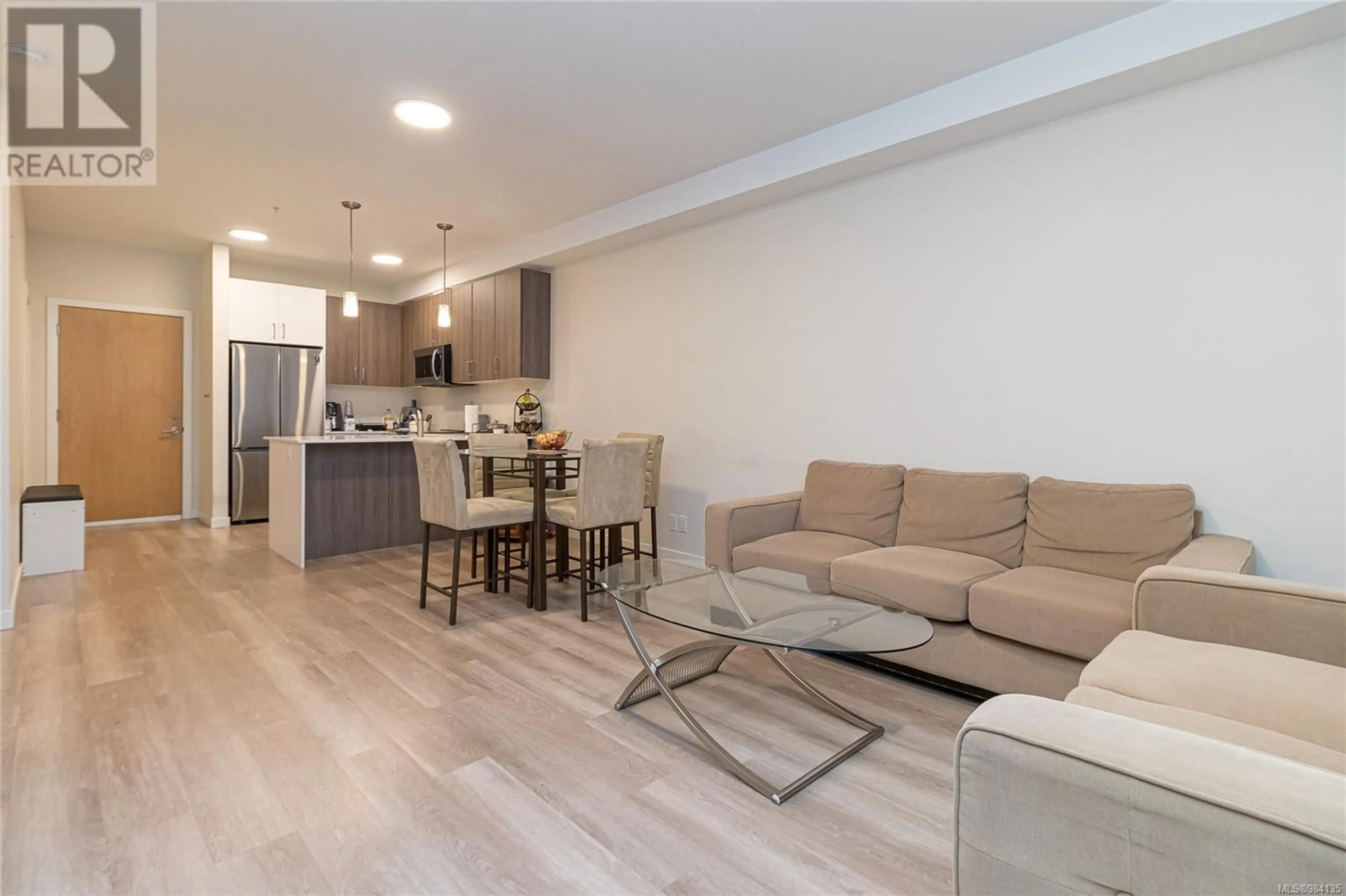 Living room with furniture, wood/laminate floor for 304 815 Orono Ave, Langford British Columbia V9B2T9