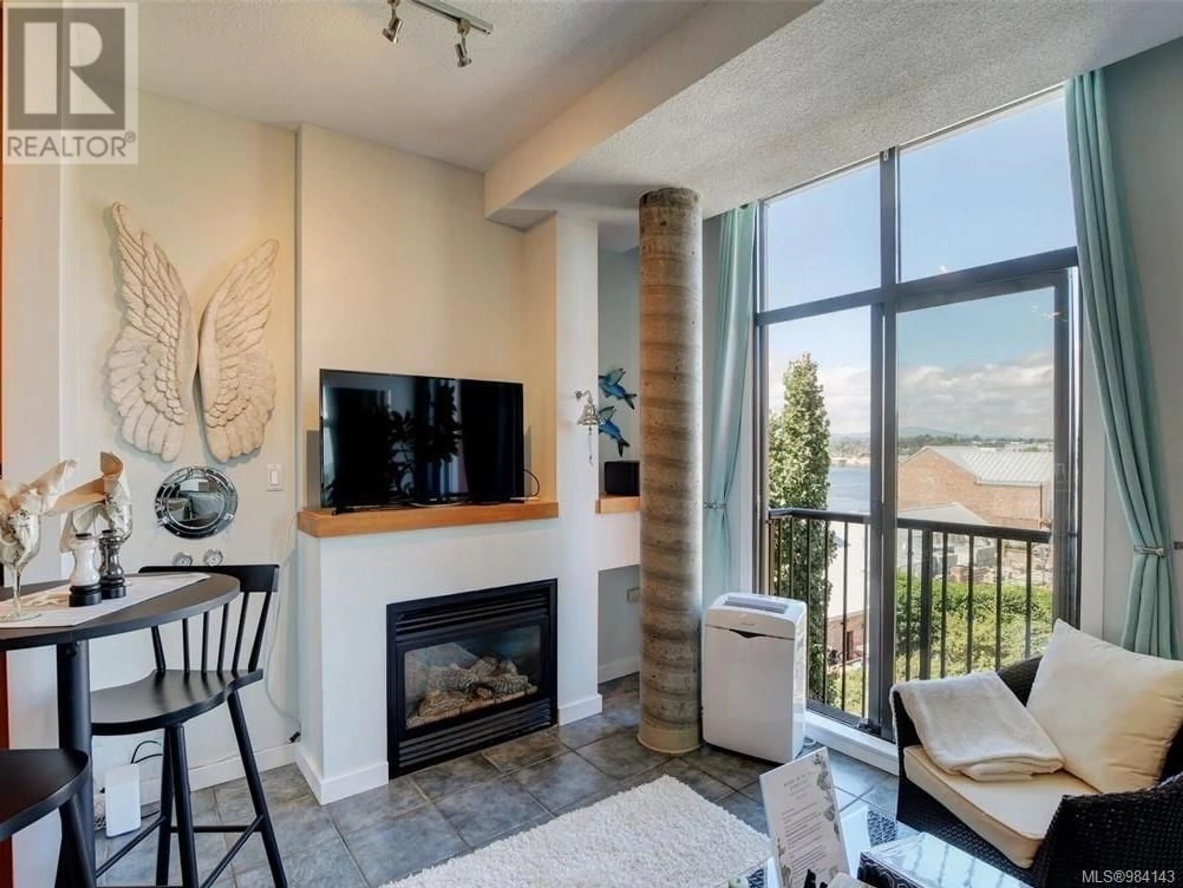 Living room with furniture, ceramic/tile floor for 423 409 Swift St, Victoria British Columbia V8W1S2