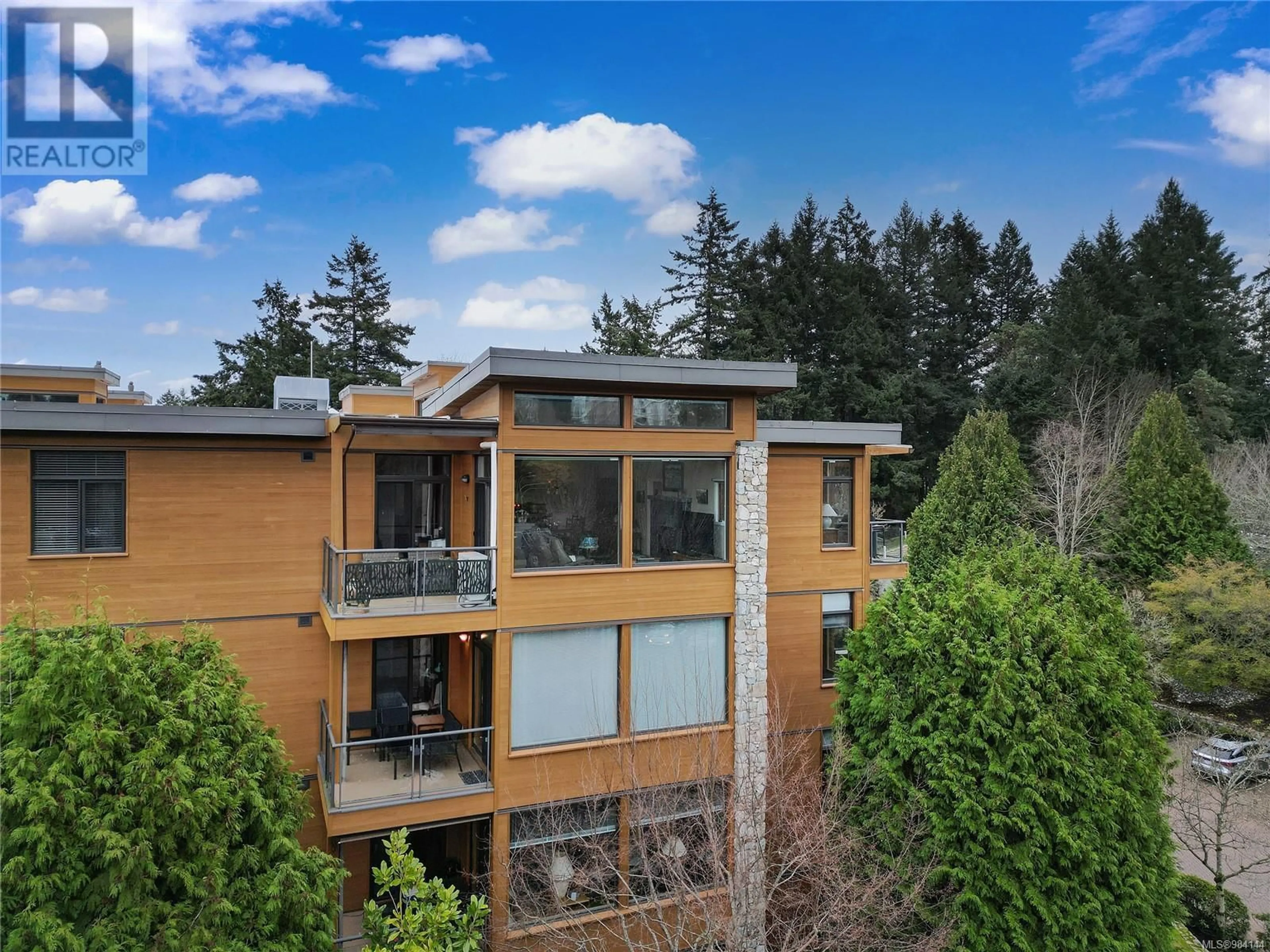 A pic from outside/outdoor area/front of a property/back of a property/a pic from drone, unknown for 407 5329 Cordova Bay Rd, Saanich British Columbia V8Y2L3