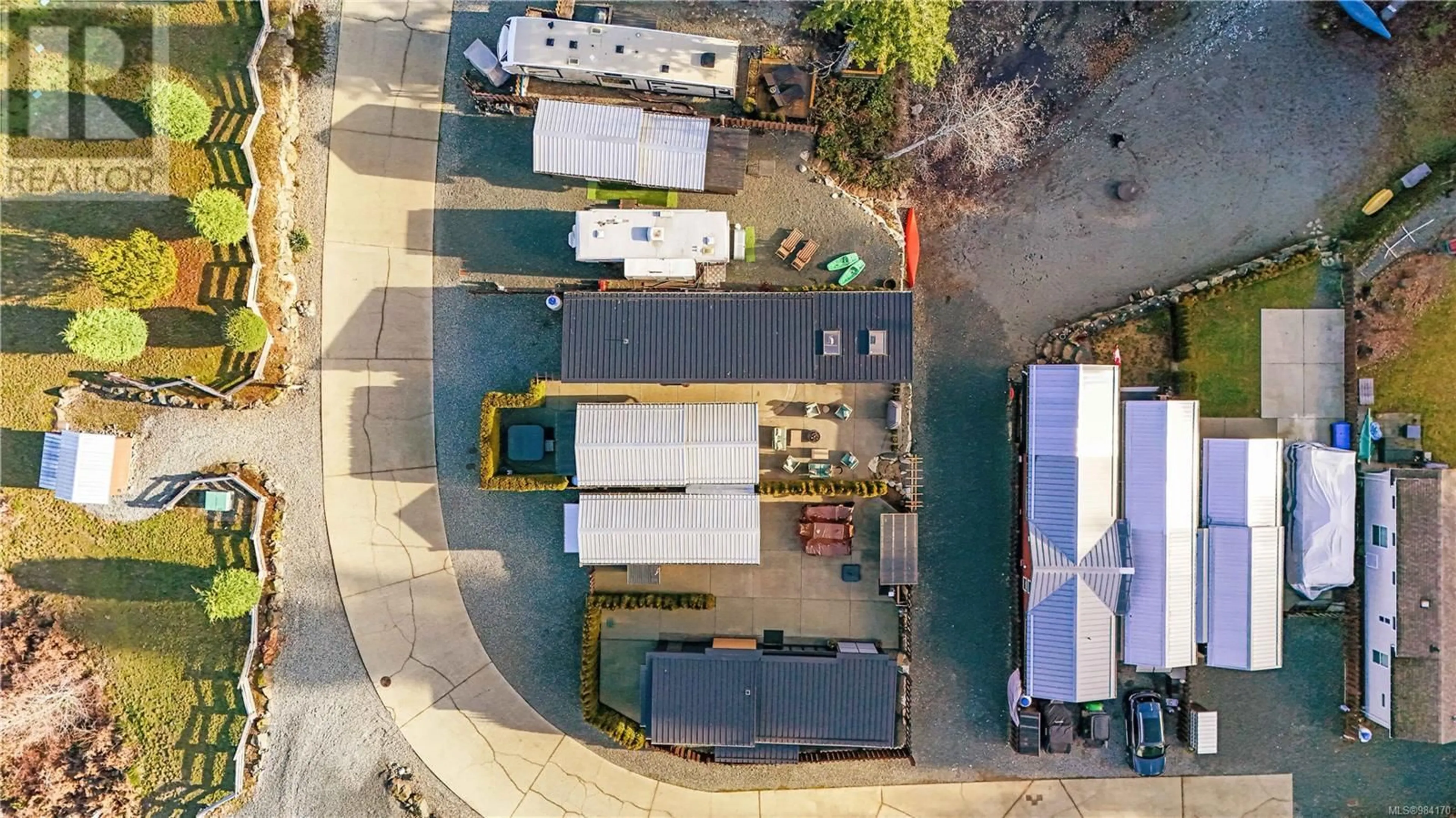 A pic from outside/outdoor area/front of a property/back of a property/a pic from drone, street for 27 - 10750 CENTRAL LAKE ROAD, Port Alberni British Columbia V9Y8Z2
