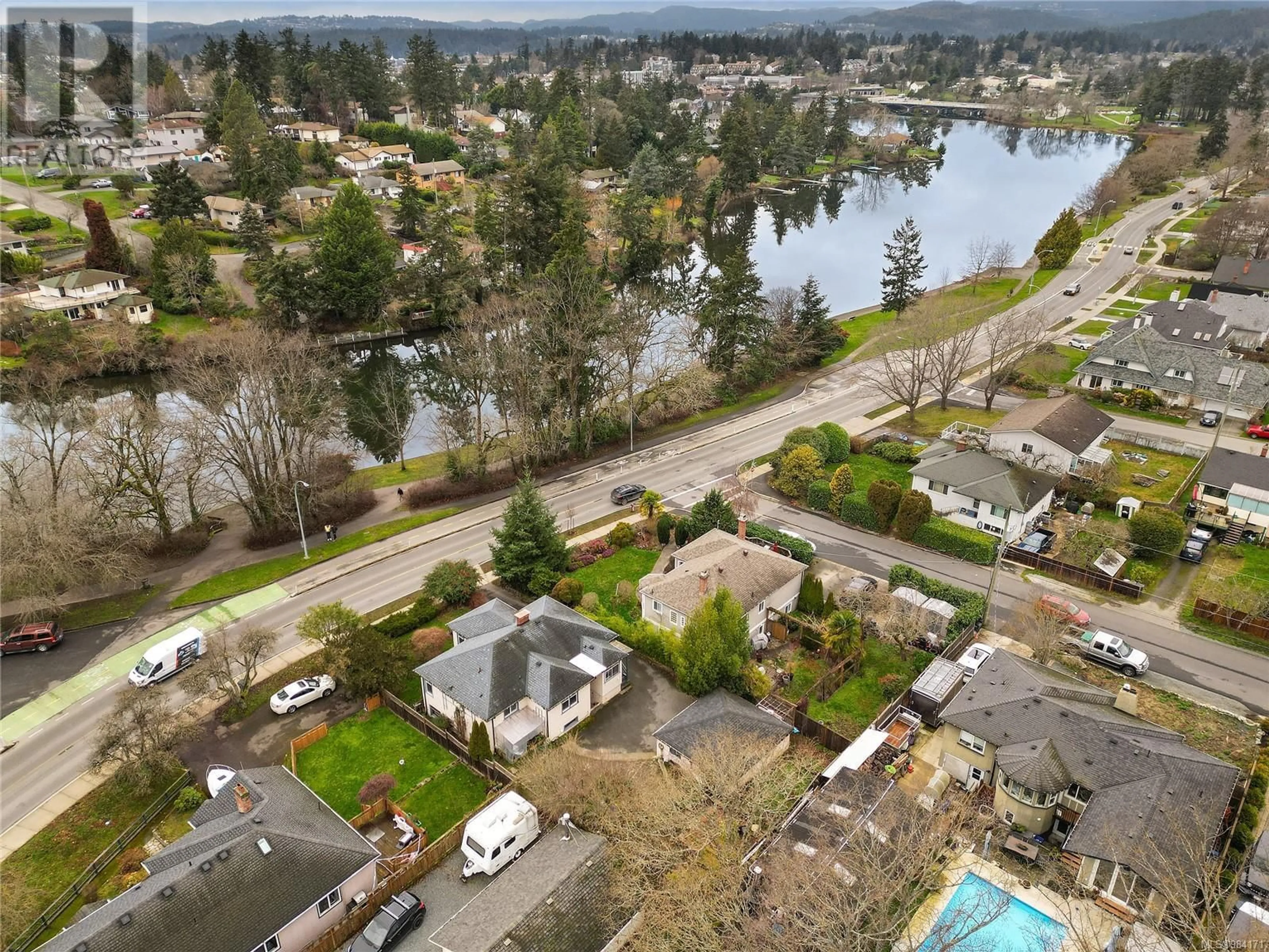 A pic from outside/outdoor area/front of a property/back of a property/a pic from drone, water/lake/river/ocean view for 746 Gorge Rd W, Saanich British Columbia V9A1N6