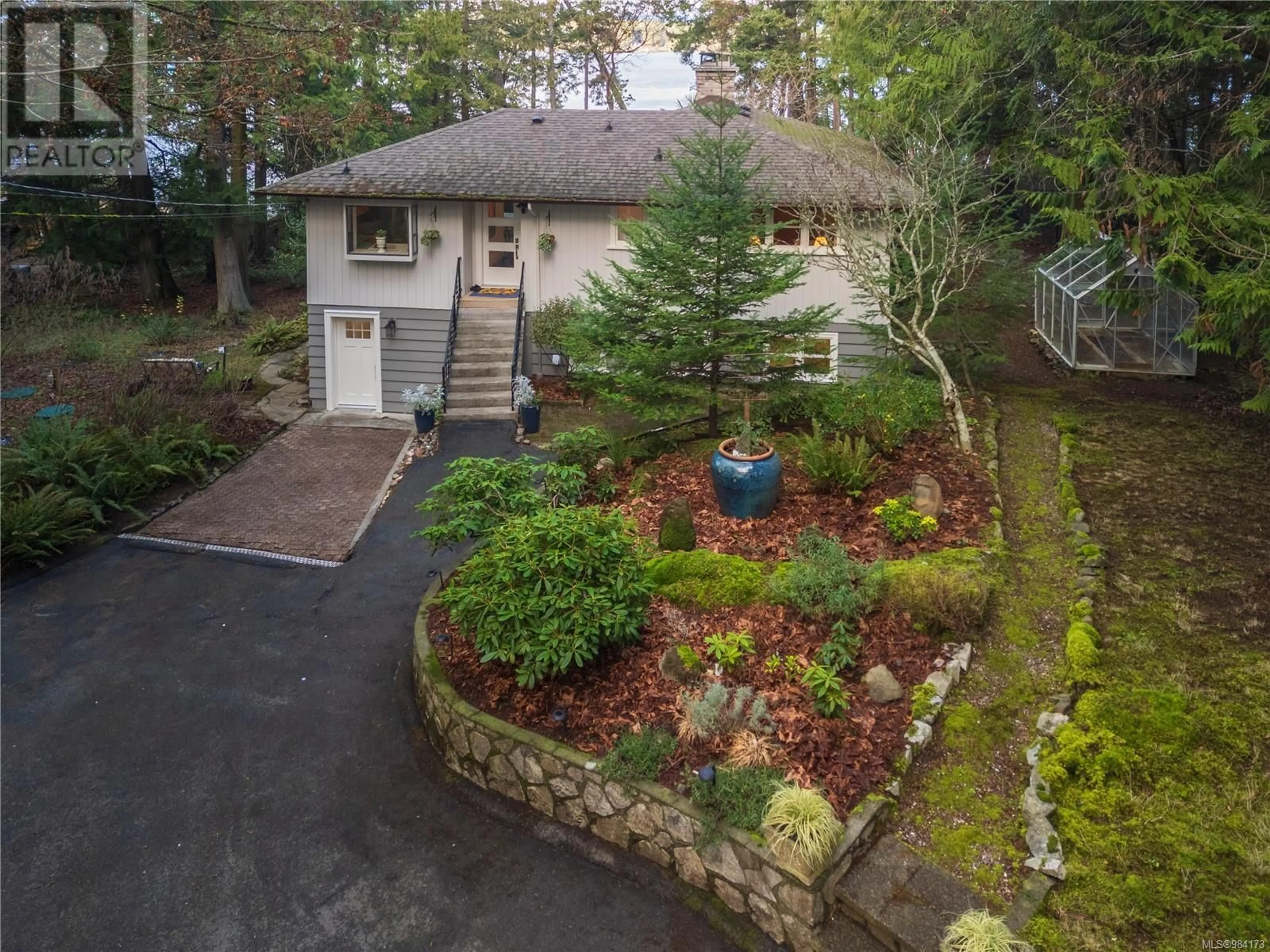 A pic from outside/outdoor area/front of a property/back of a property/a pic from drone, street for 2320 Dolphin Rd, North Saanich British Columbia V8L5V2