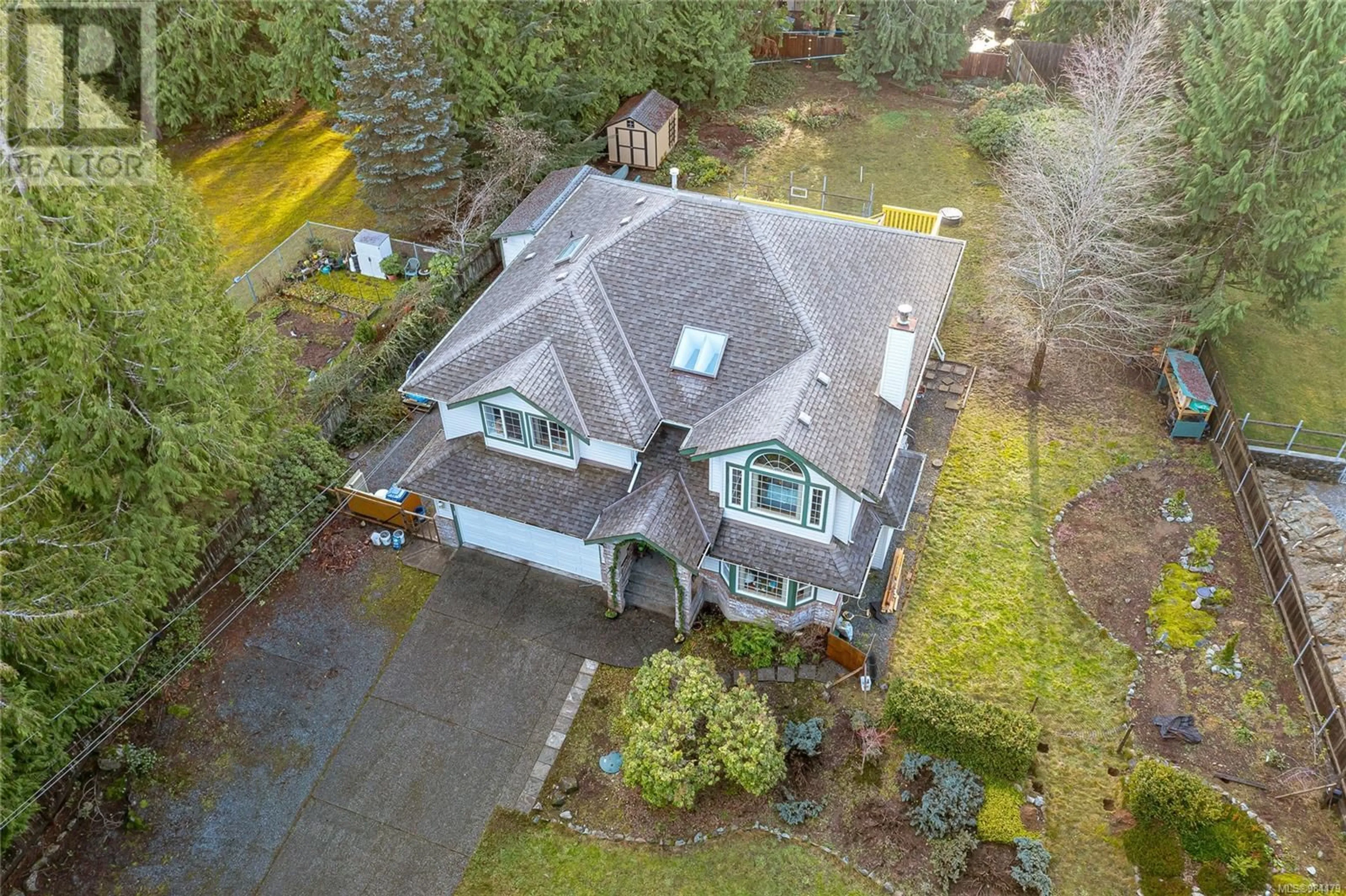 A pic from outside/outdoor area/front of a property/back of a property/a pic from drone, unknown for 1642 Wilmot Ave, Shawnigan Lake British Columbia V8H3C1