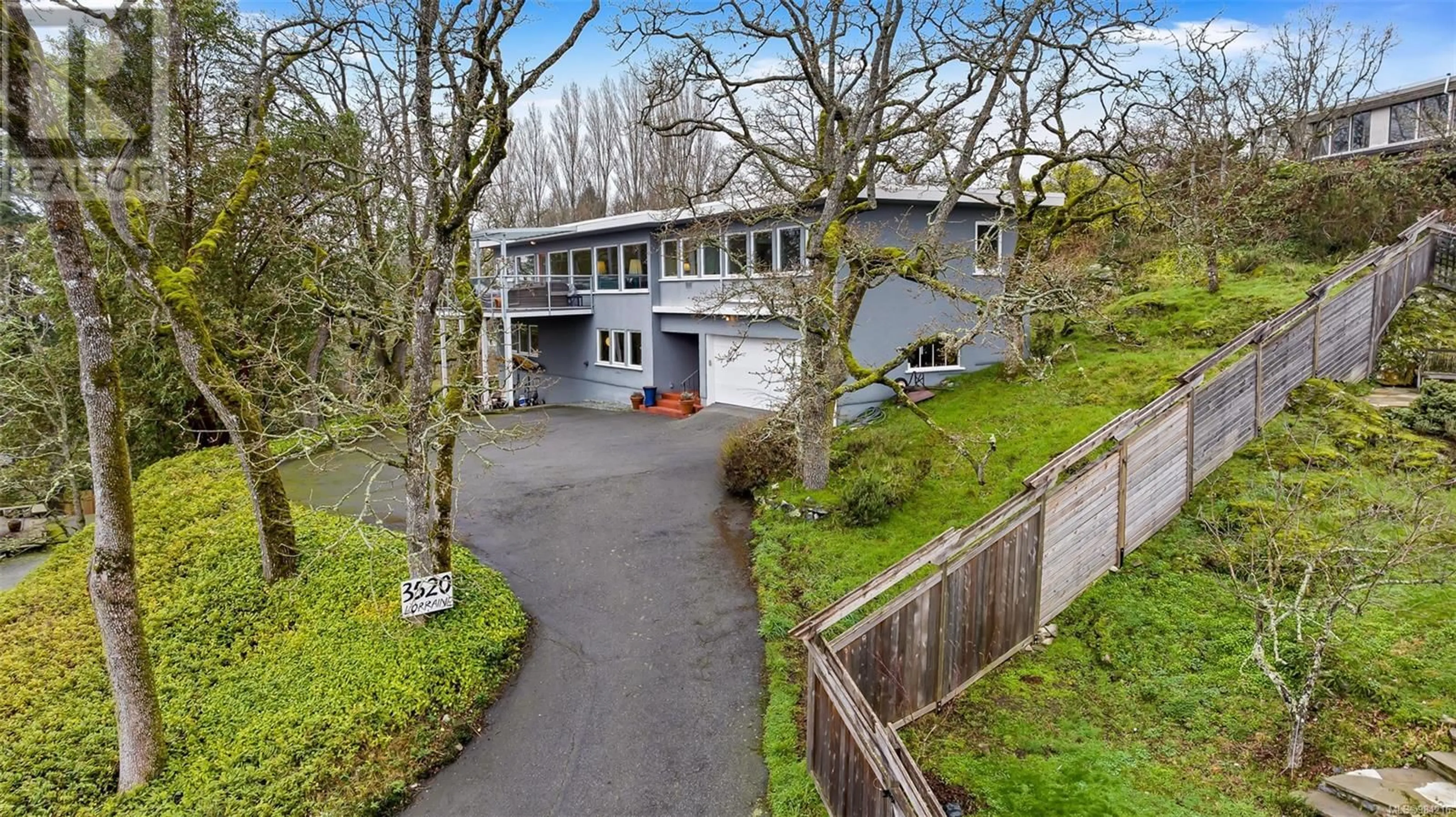 A pic from outside/outdoor area/front of a property/back of a property/a pic from drone, street for 3520 Lorraine Rd, Saanich British Columbia V8P4V3