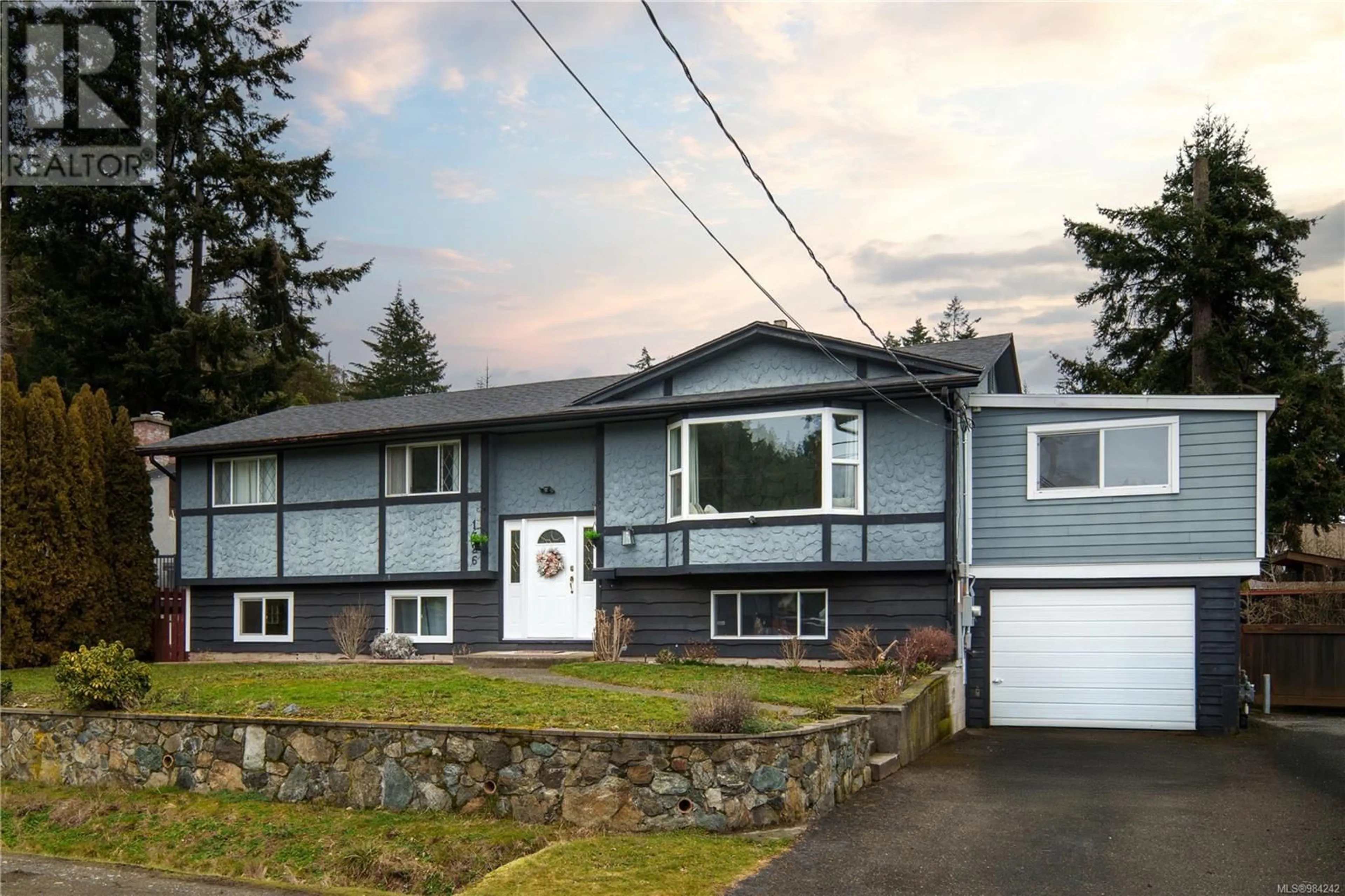 Home with vinyl exterior material, street for 1326 Justine Pl, Langford British Columbia V9B4J2