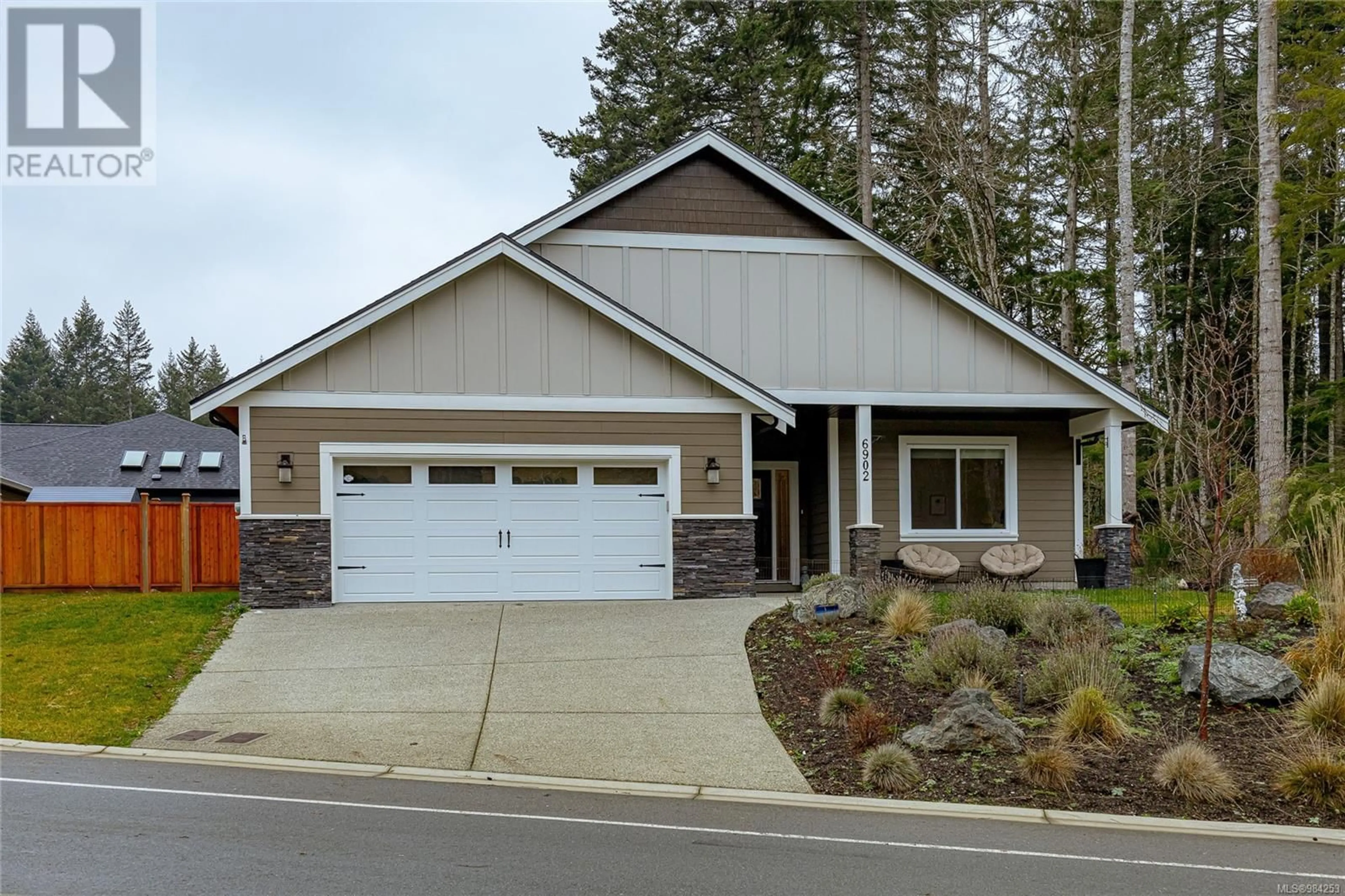 Home with vinyl exterior material, street for 6902 Ridgecrest Rd, Sooke British Columbia V0S1N0