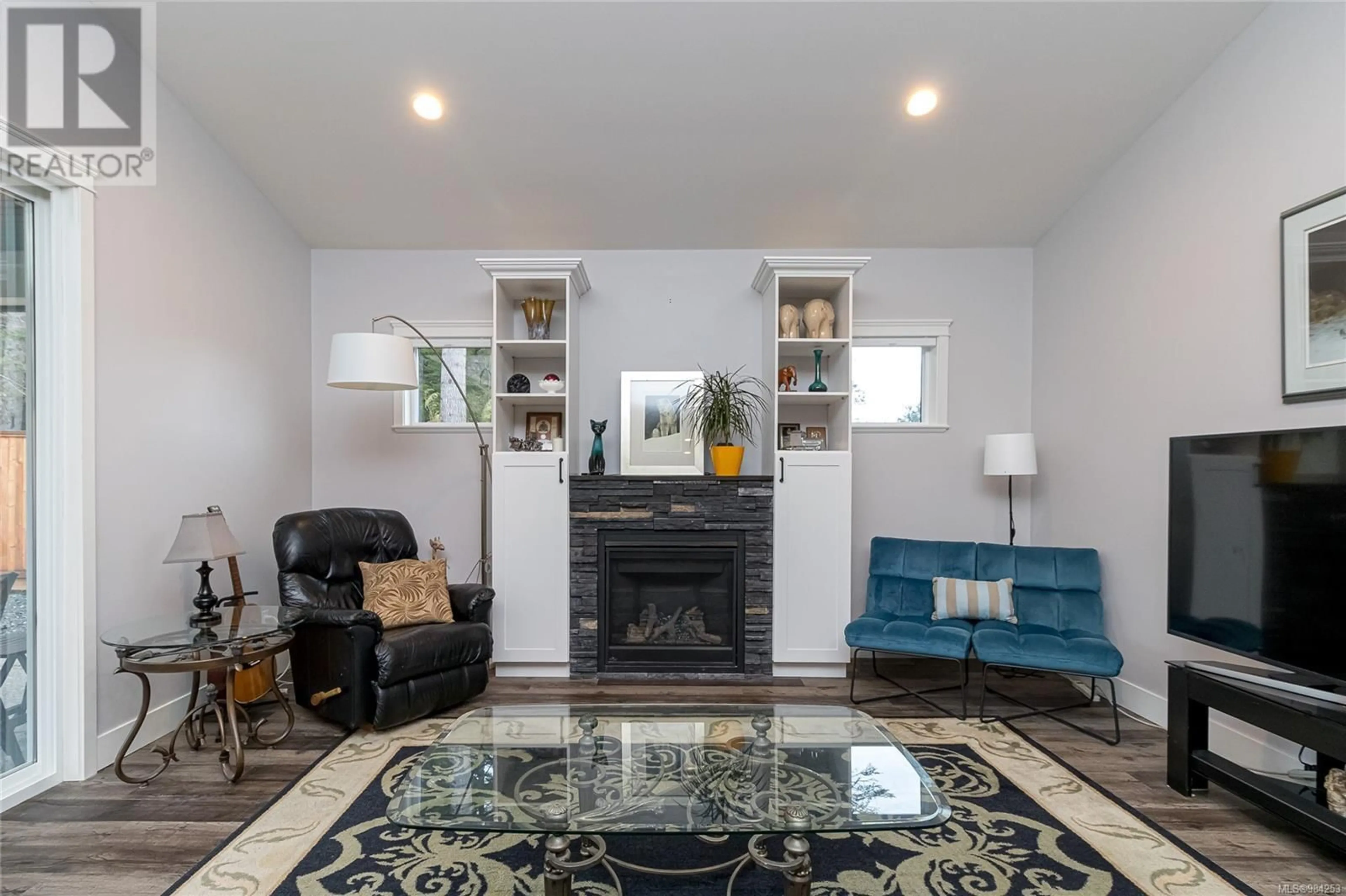 Living room with furniture, ceramic/tile floor for 6902 Ridgecrest Rd, Sooke British Columbia V0S1N0