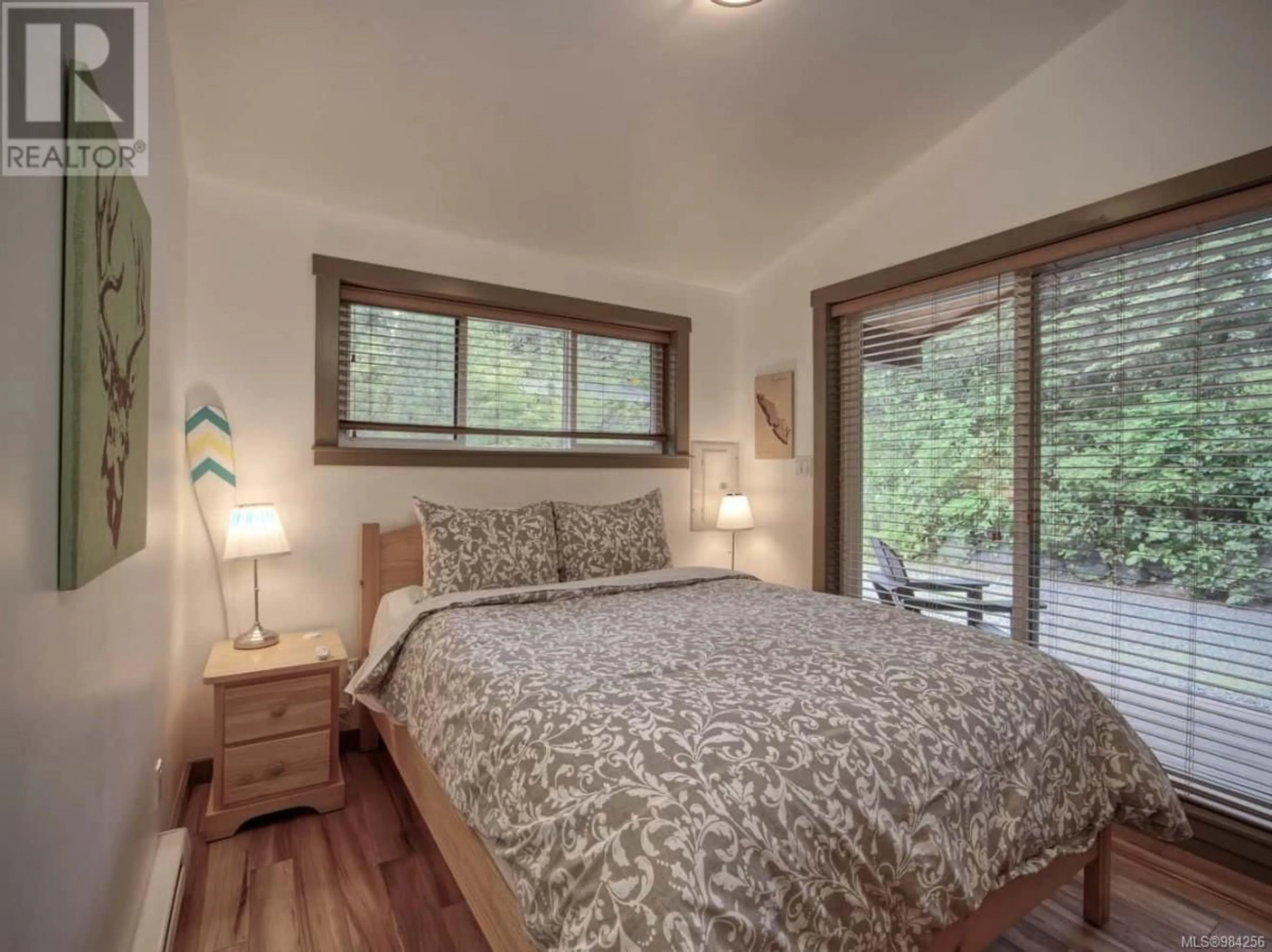 Bedroom with bed, wood/laminate floor for 40 6574 Baird Rd, Port Renfrew British Columbia V0S1K0