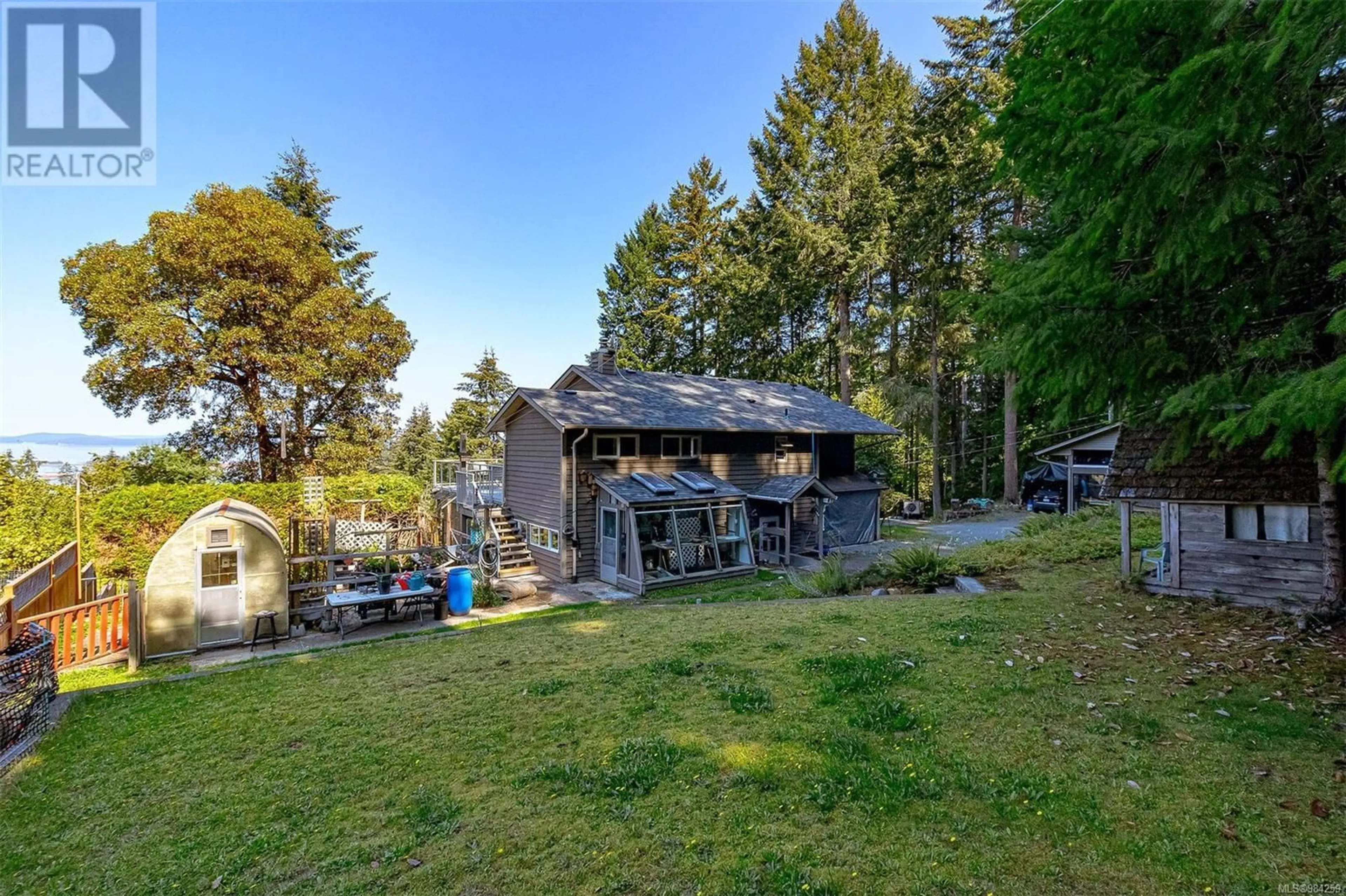 A pic from outside/outdoor area/front of a property/back of a property/a pic from drone, water/lake/river/ocean view for 1410 Chilco Rd, Crofton British Columbia V0R1R0