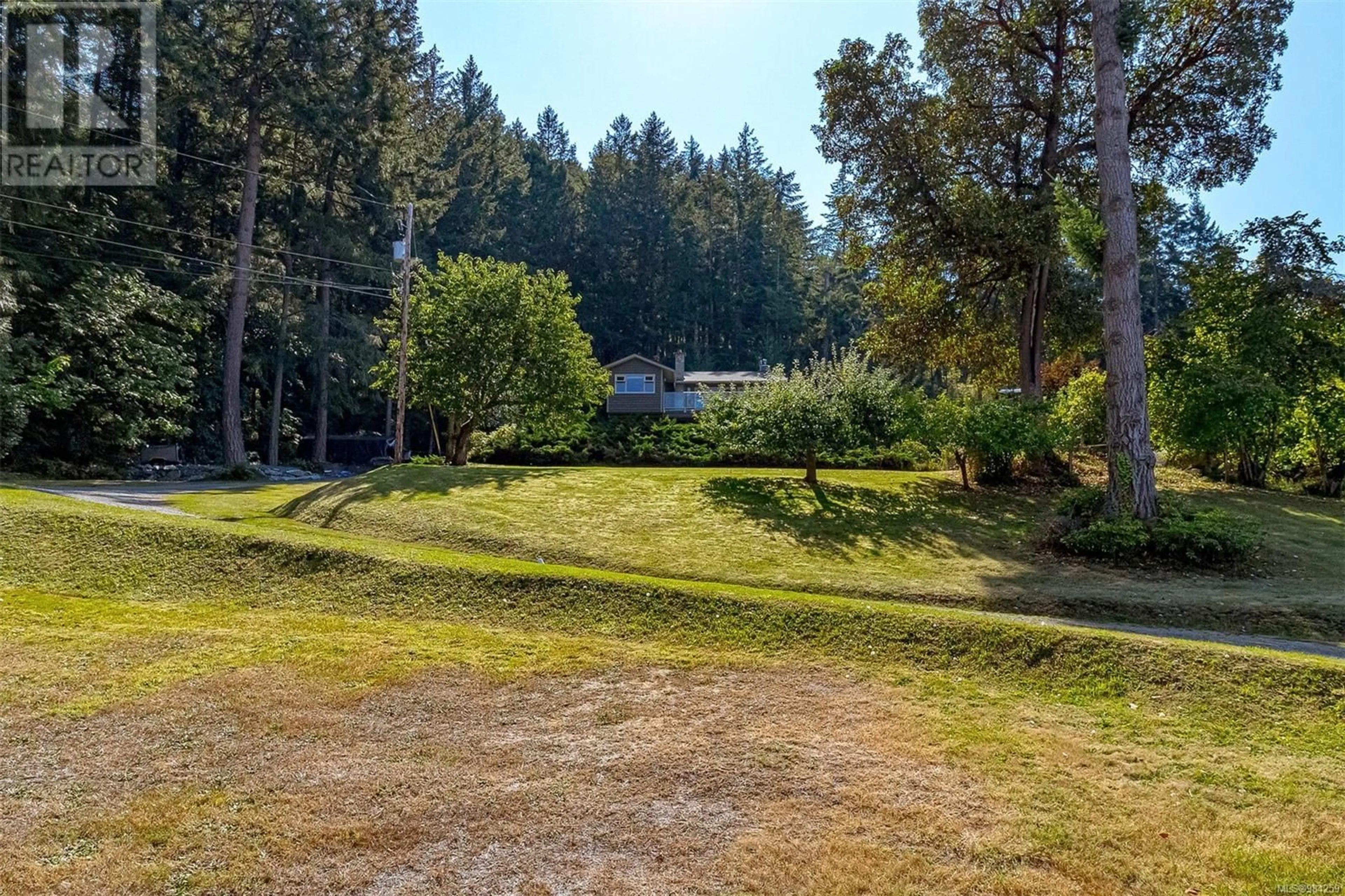 A pic from outside/outdoor area/front of a property/back of a property/a pic from drone, forest/trees view for 1410 Chilco Rd, Crofton British Columbia V0R1R0