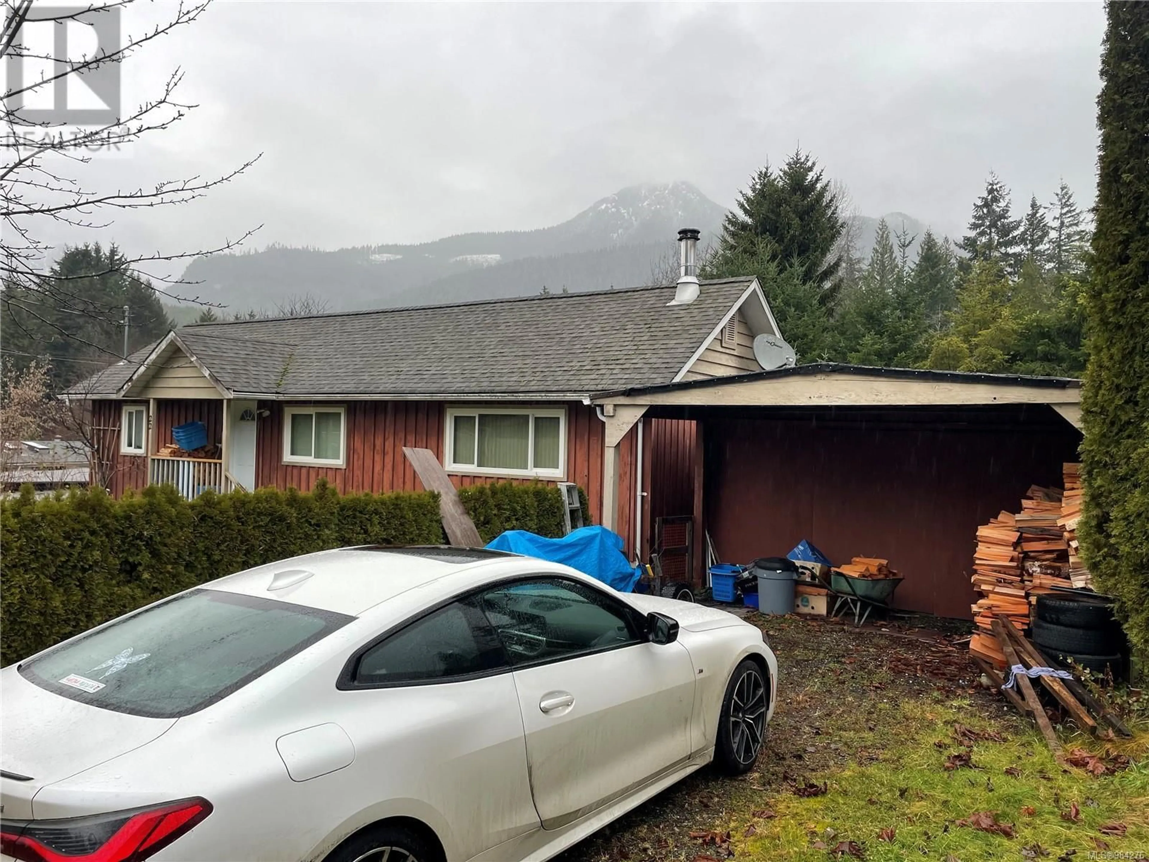 A pic from outside/outdoor area/front of a property/back of a property/a pic from drone, mountain view for 22 Hoomak Ave, Woss British Columbia V0N3P0