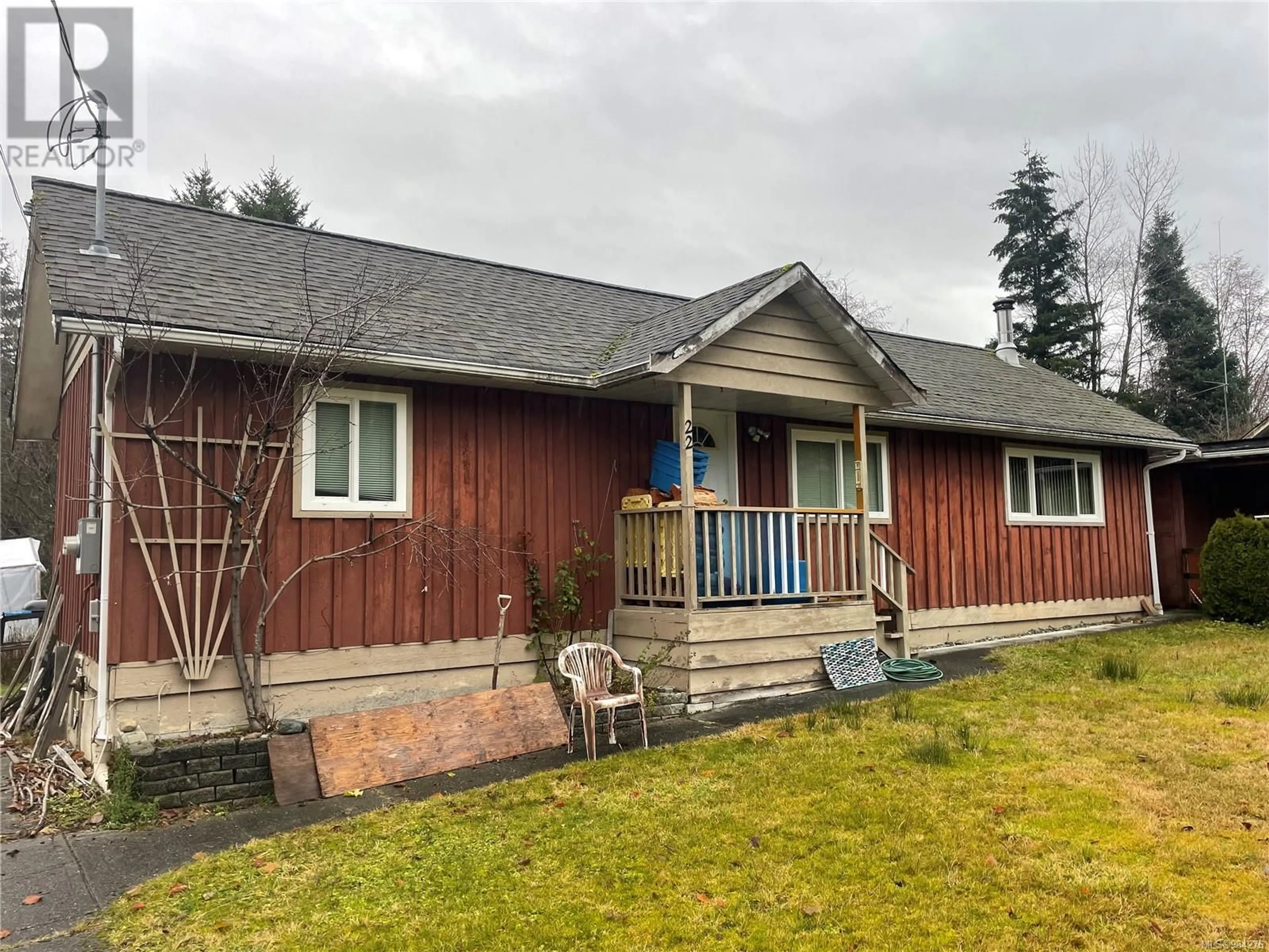 Home with vinyl exterior material, street for 22 Hoomak Ave, Woss British Columbia V0N3P0