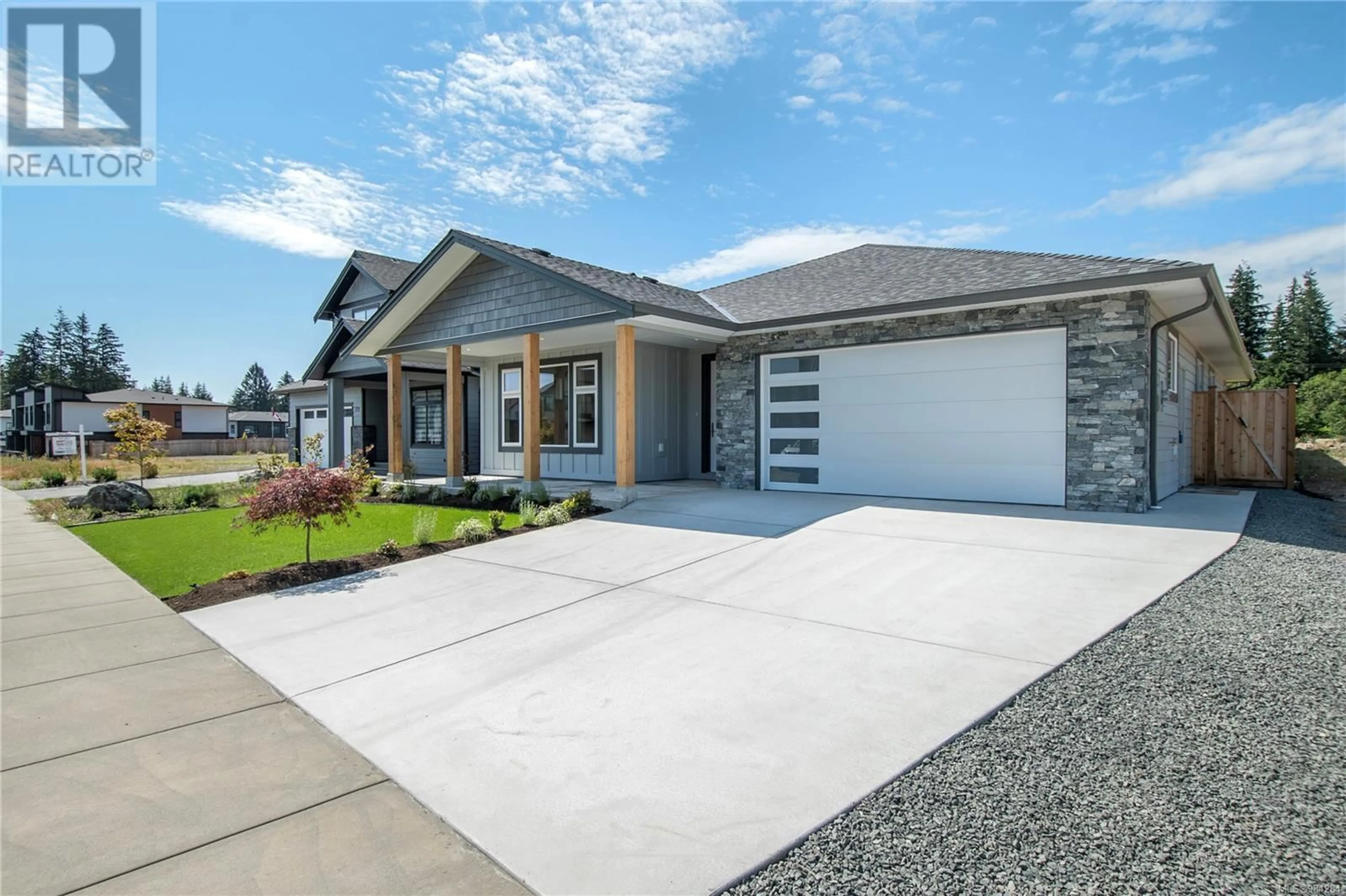 Home with brick exterior material, street for 725 Beaver Creek Blvd, Campbell River British Columbia V9H0E5