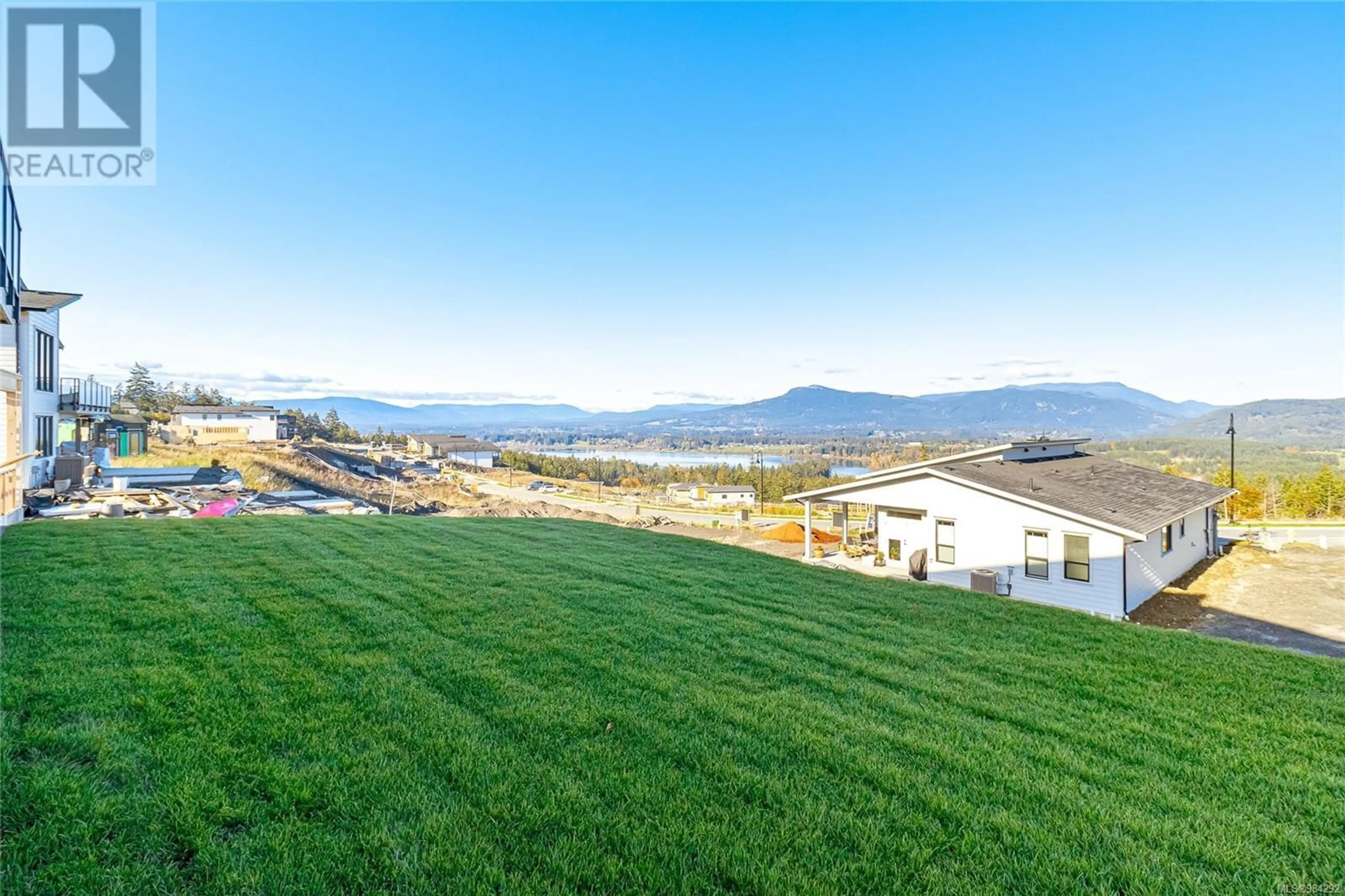 A pic from outside/outdoor area/front of a property/back of a property/a pic from drone, mountain view for 3163 Woodrush Dr, Duncan British Columbia V9L0G1