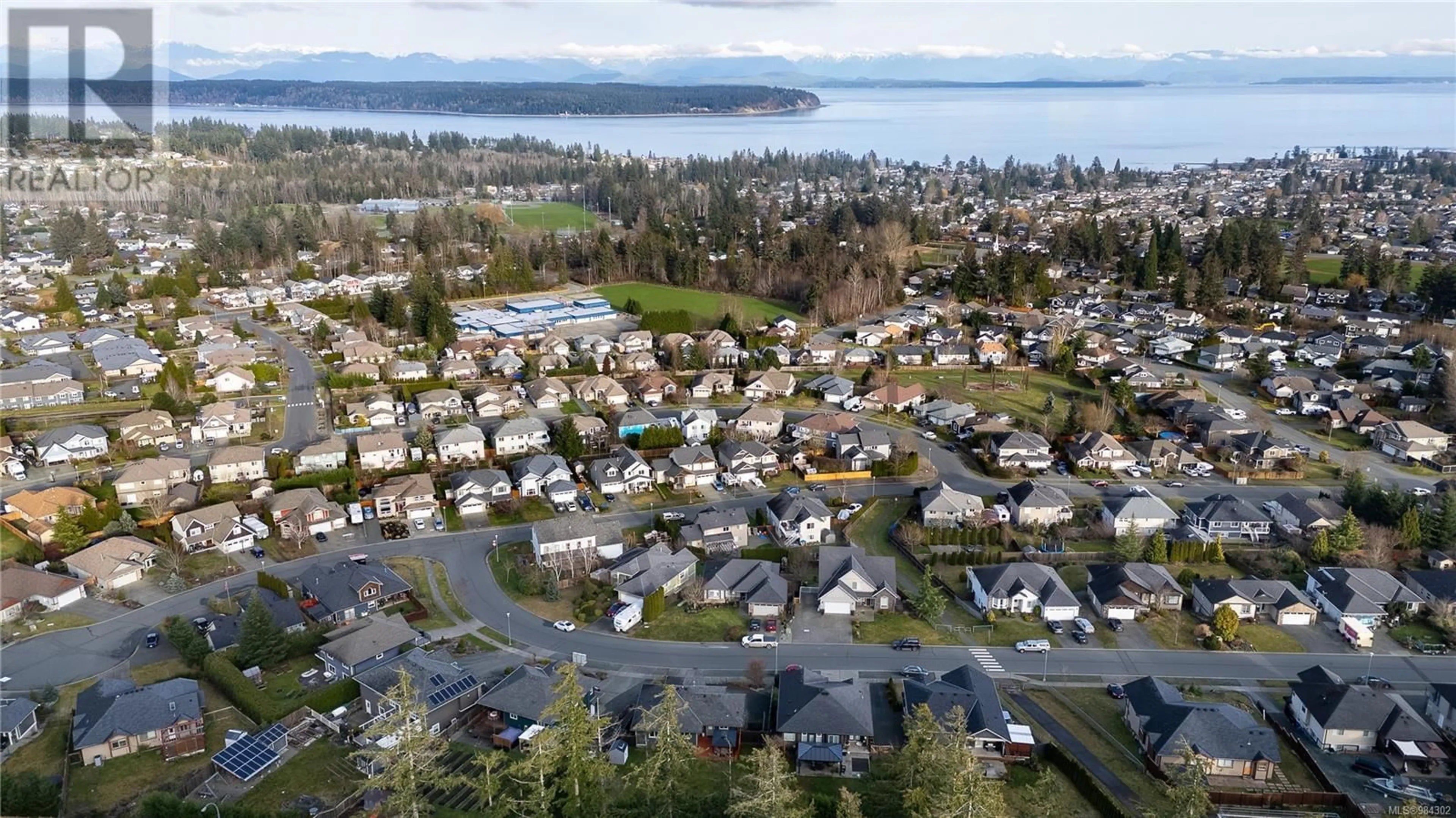 A pic from outside/outdoor area/front of a property/back of a property/a pic from drone, water/lake/river/ocean view for 997 TIMBERLINE Dr, Campbell River British Columbia V9H1W1