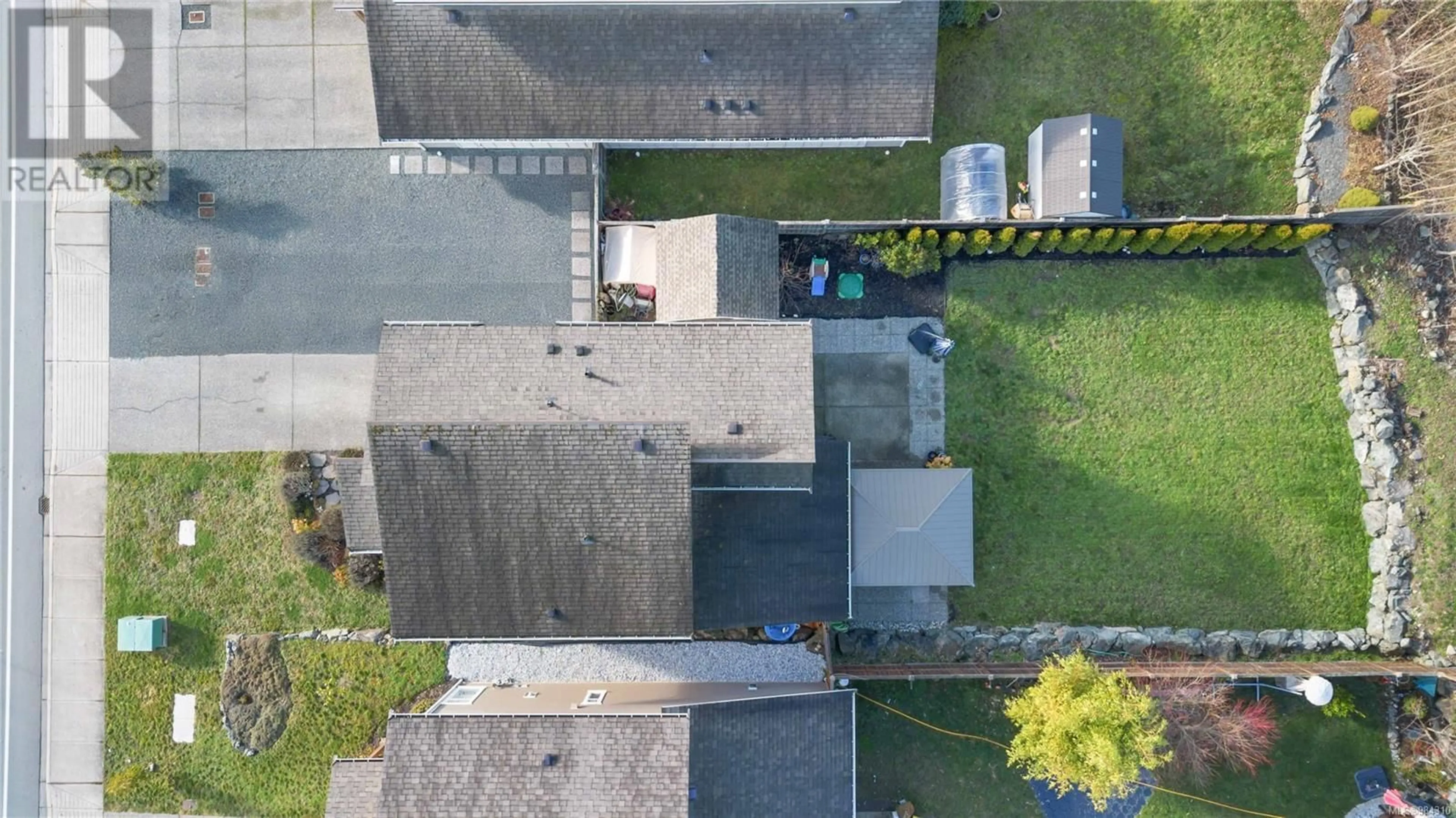 A pic from outside/outdoor area/front of a property/back of a property/a pic from drone, street for 2456 Phillips Rd, Sooke British Columbia V9Z0Y3