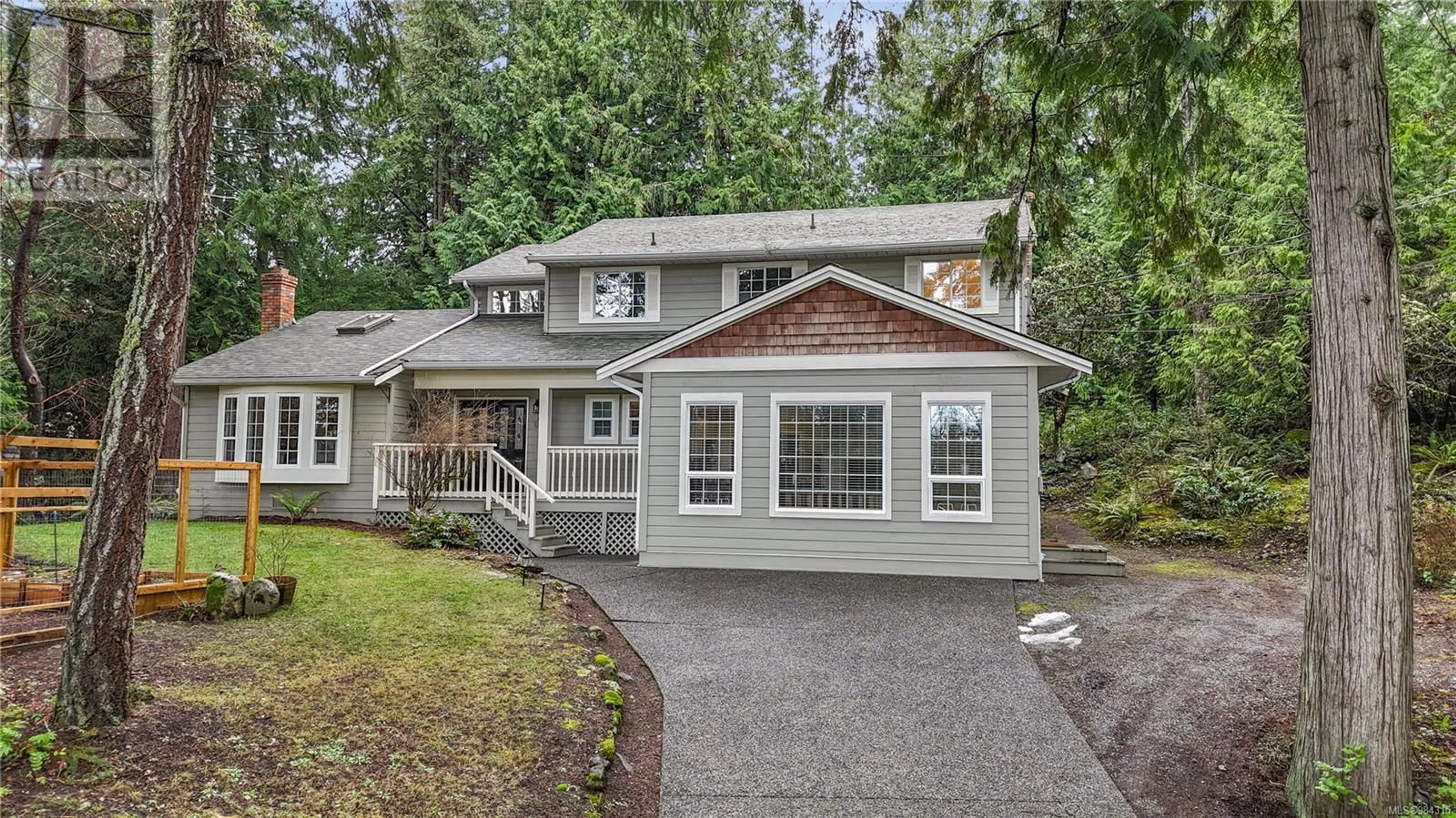 Home with vinyl exterior material, street for 1945 Lands End Rd, North Saanich British Columbia V8L5J2