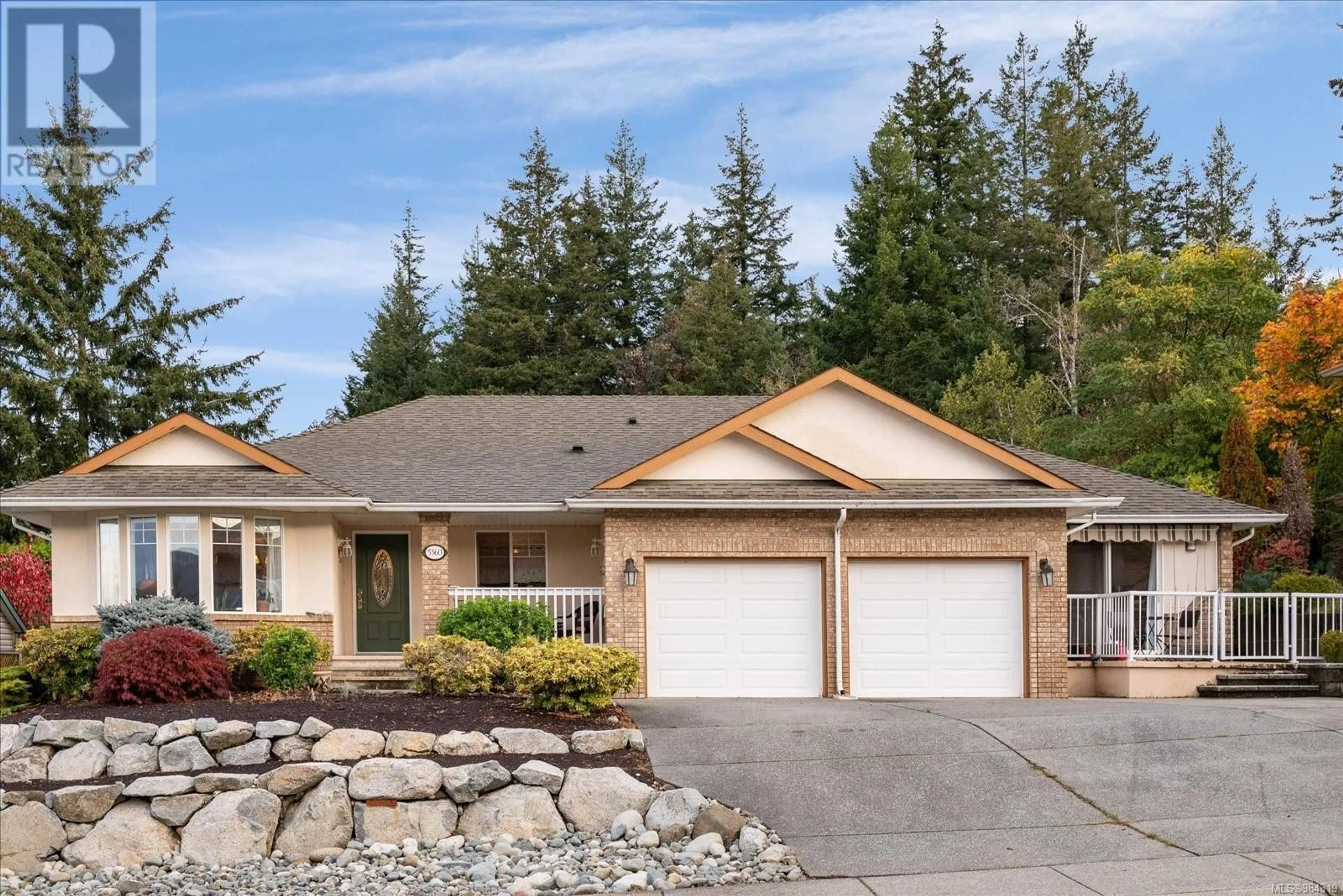 Home with vinyl exterior material, street for 5360 Colbourne Dr, Nanaimo British Columbia V9T6N5