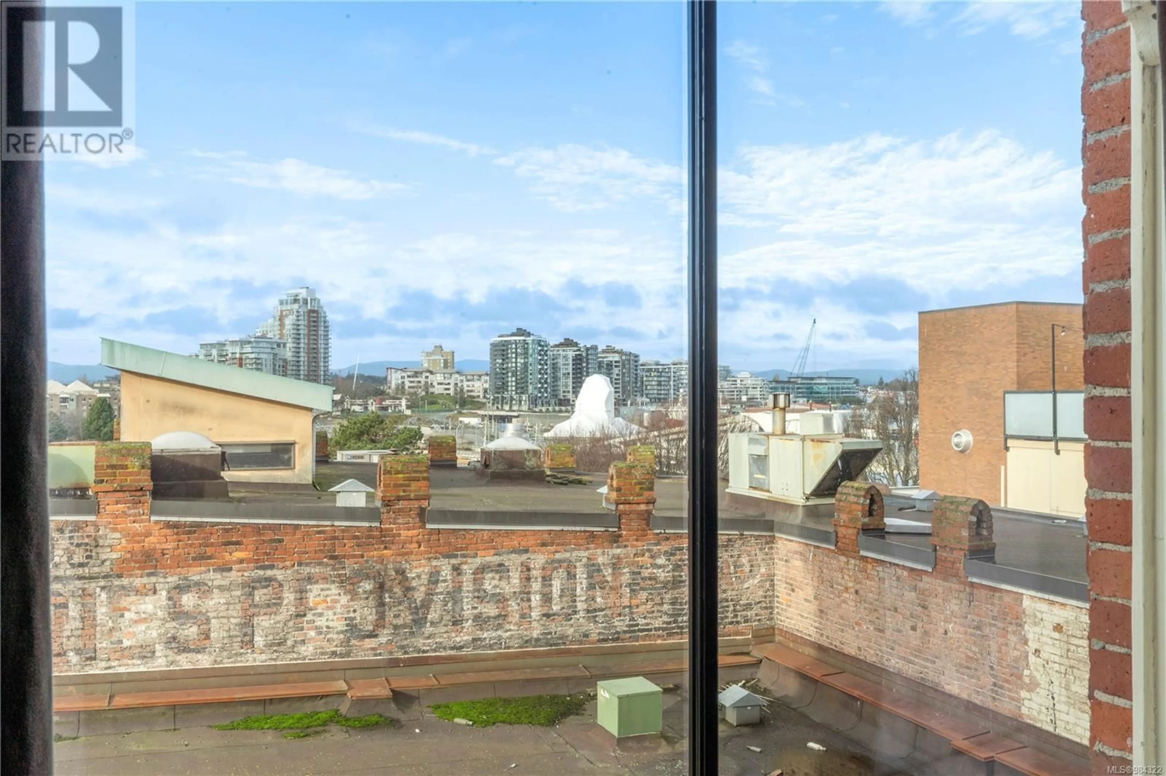 Patio, city buildings view from balcony for 303 524 Yates St, Victoria British Columbia V8W1K8