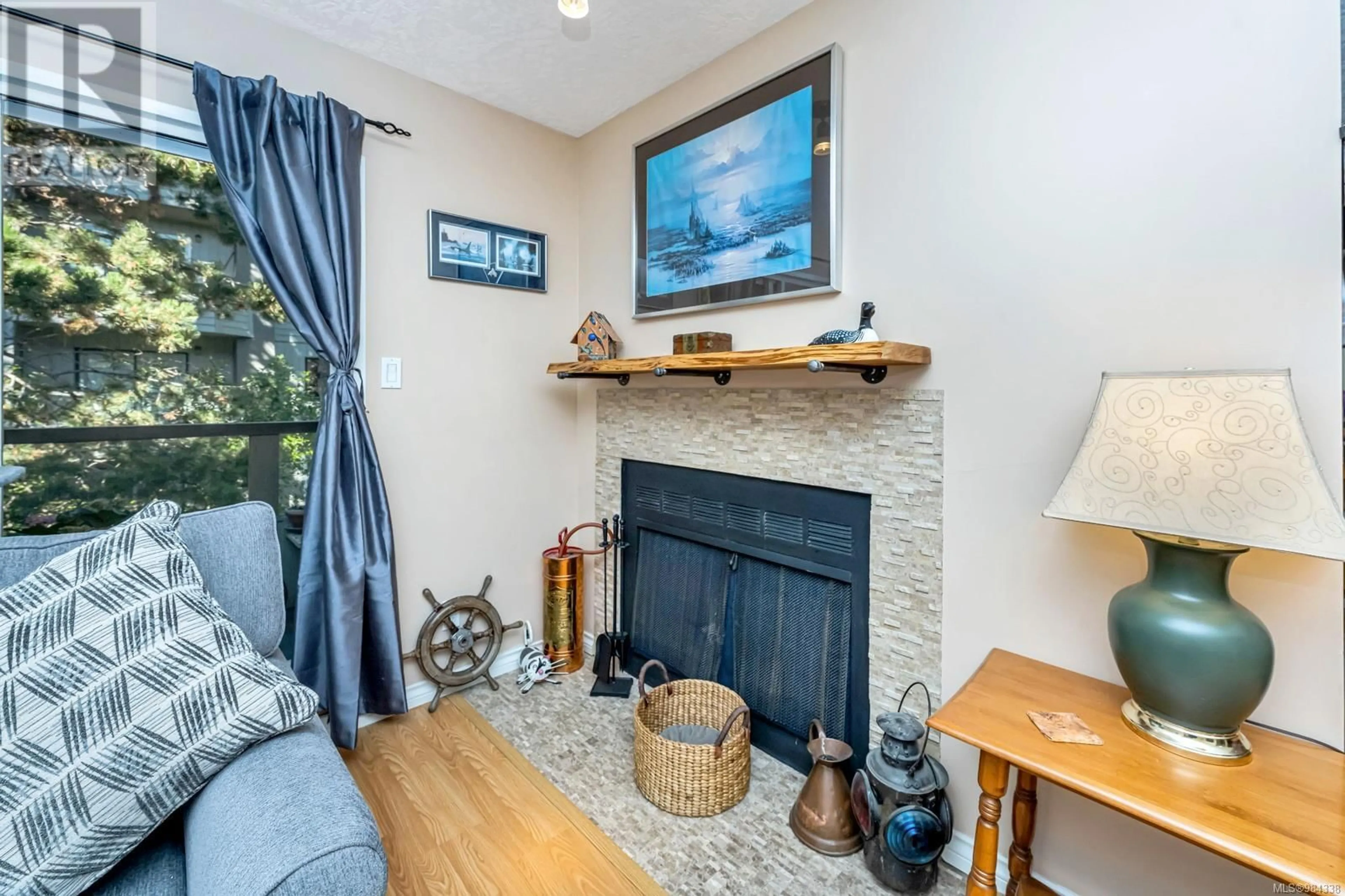 Living room with furniture, unknown for 203 - 940 INVERNESS ROAD, Saanich British Columbia V8X2R9