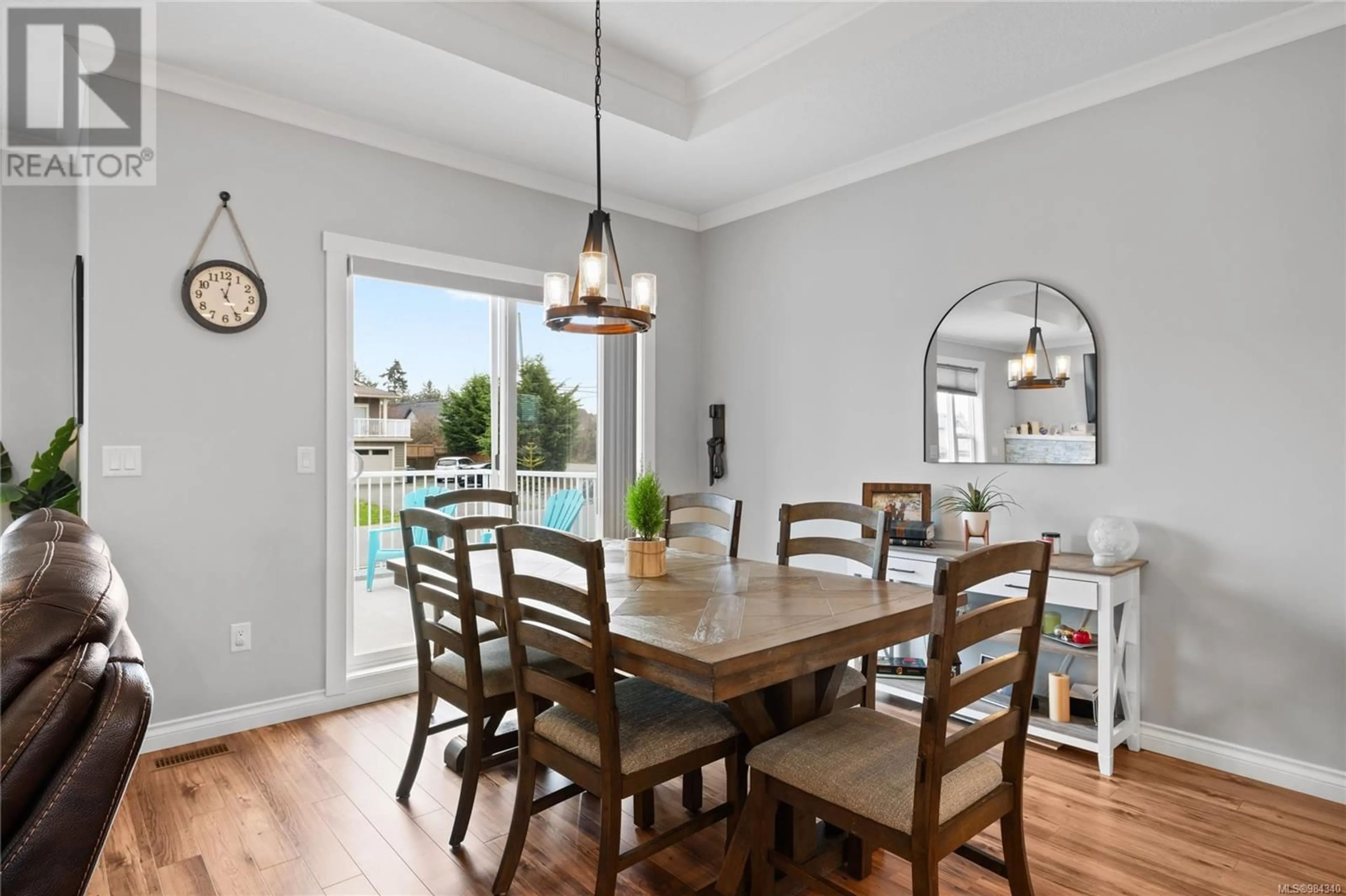 Dining room, wood/laminate floor for 991 Sanika Close, French Creek British Columbia V9P0B8