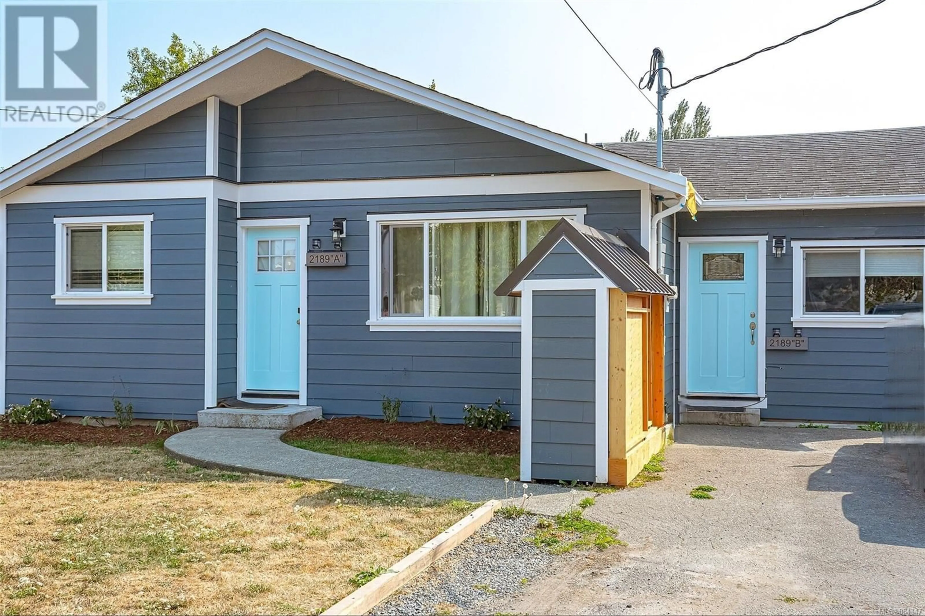 Home with vinyl exterior material, street for 2189A+2189B Amelia Ave, Sidney British Columbia V8L2H5