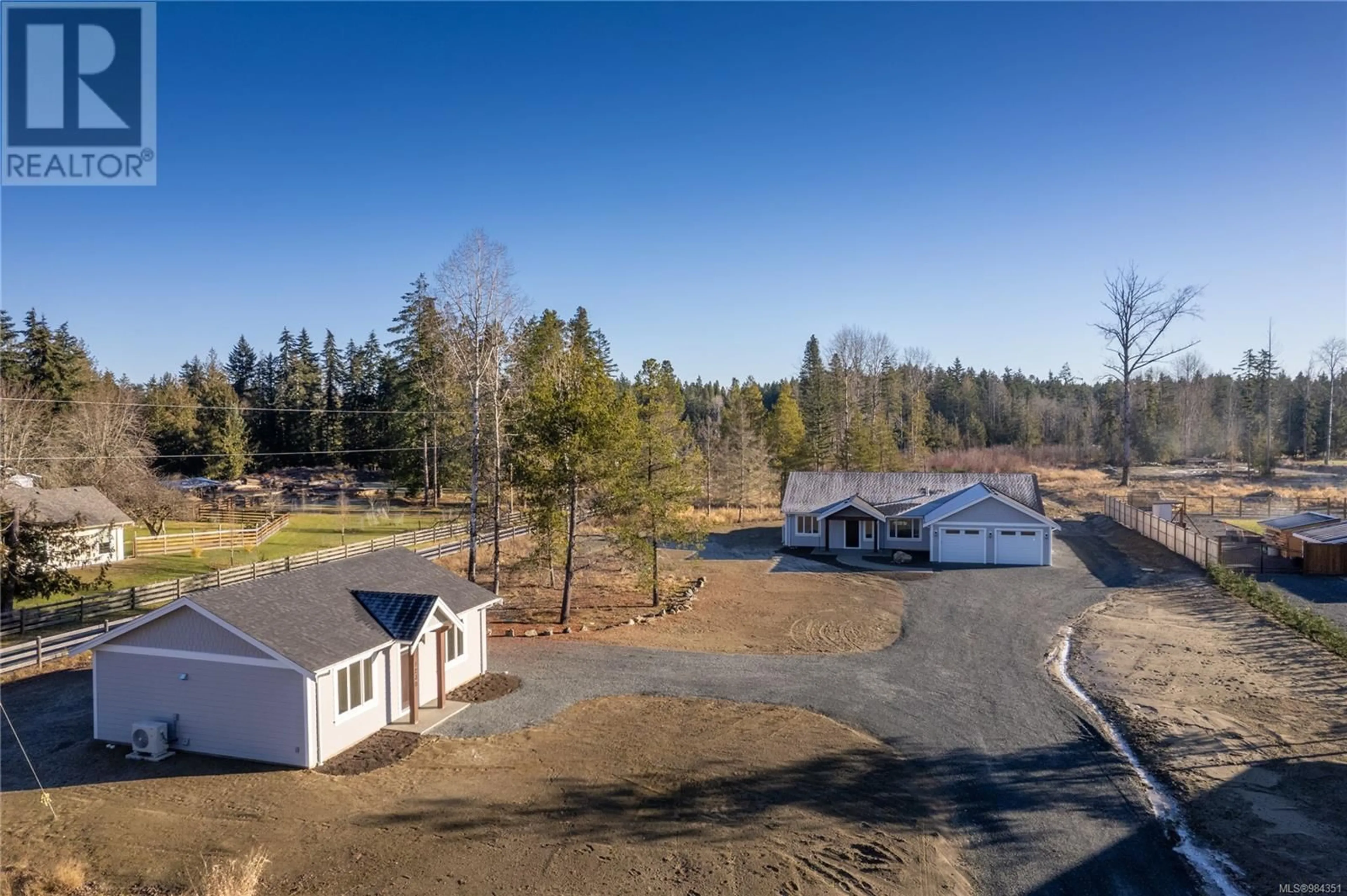 A pic from outside/outdoor area/front of a property/back of a property/a pic from drone, unknown for 1230 / 1232 Station Rd, Coombs British Columbia V0R1M0