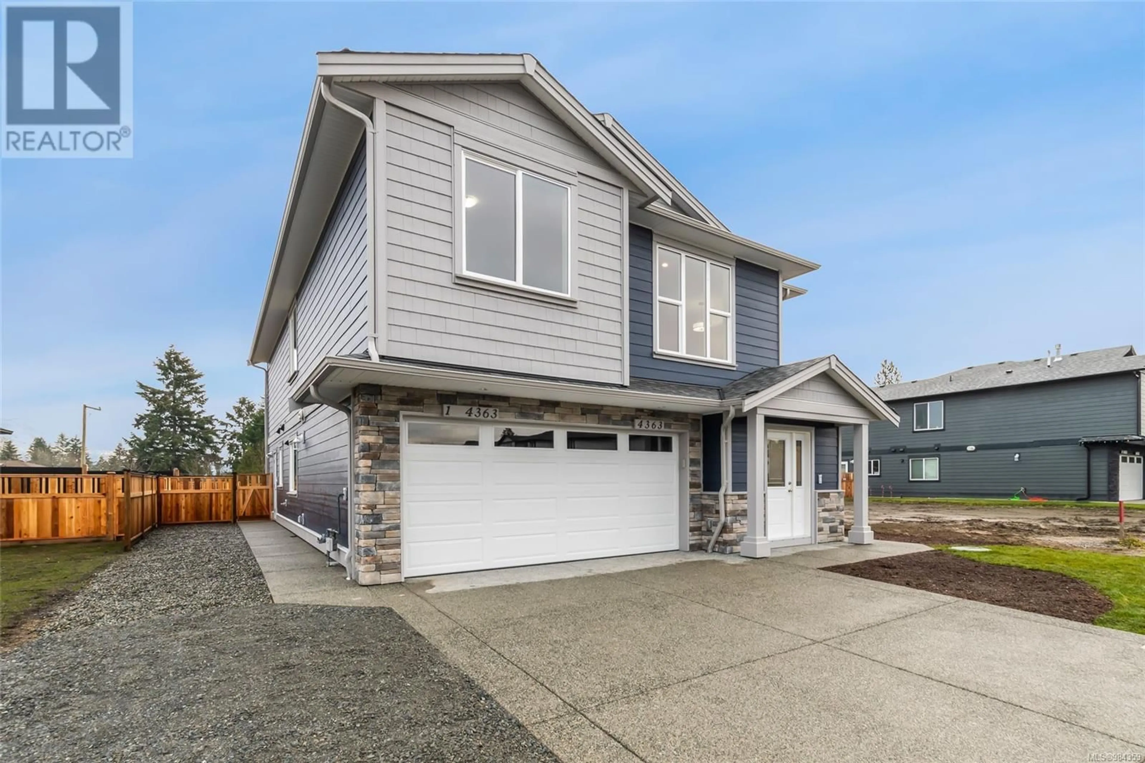 Home with vinyl exterior material, street for 4363 Bains Mill Rd, Duncan British Columbia V9L4G5