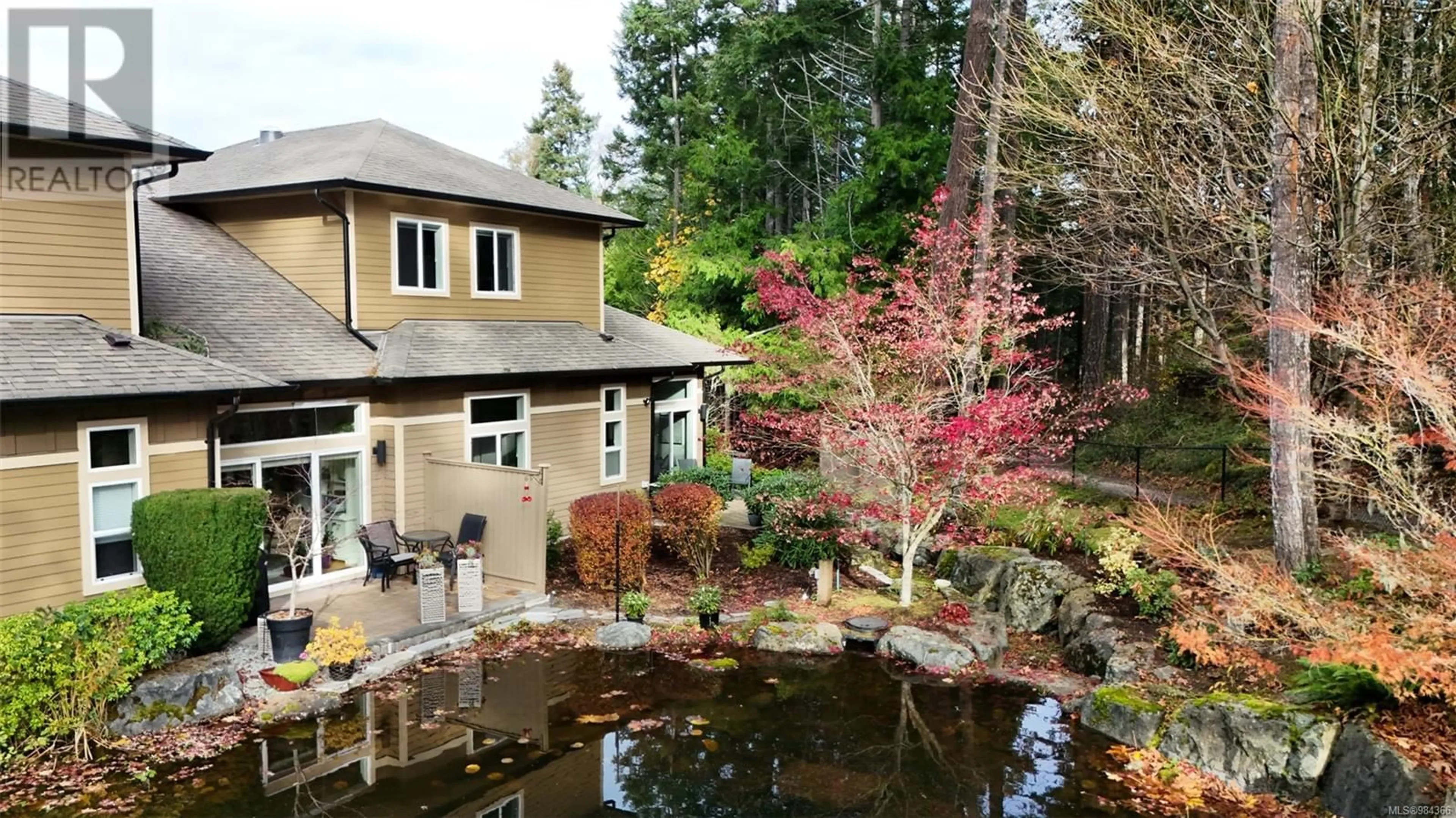 A pic from outside/outdoor area/front of a property/back of a property/a pic from drone, water/lake/river/ocean view for 105 3640 Propeller Pl, Colwood British Columbia V9C0G1