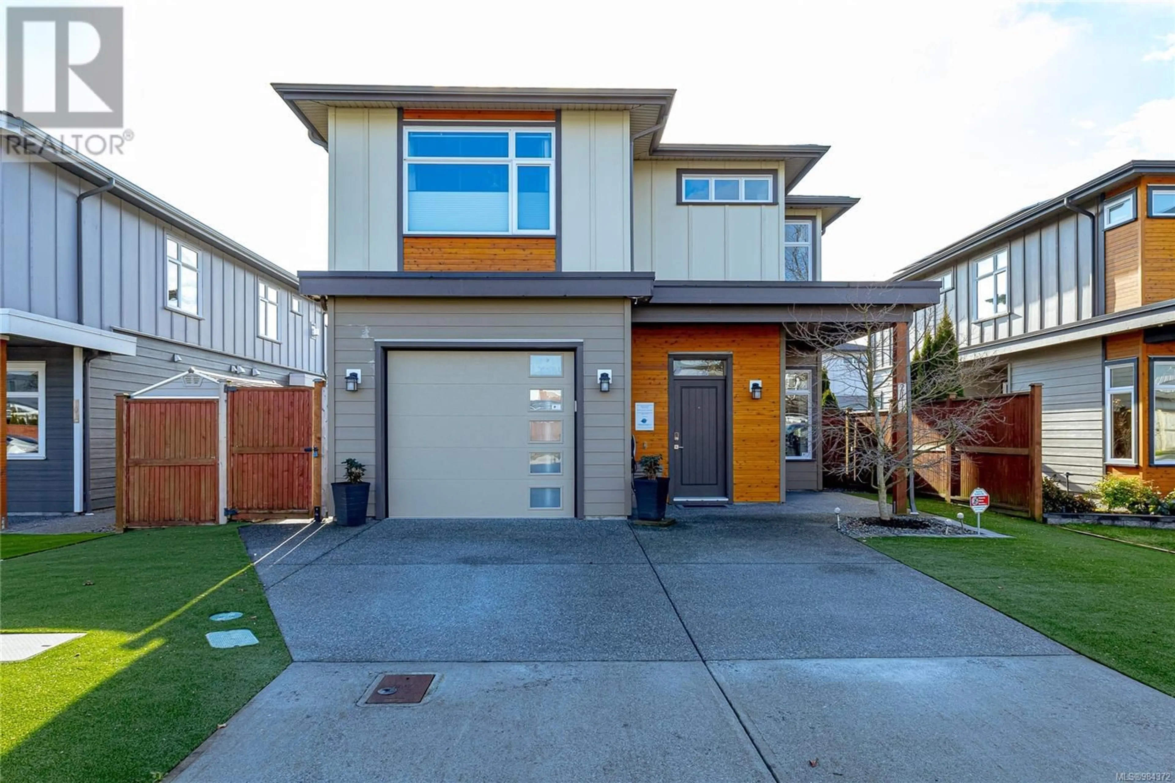 Home with vinyl exterior material, street for 2111 Wood Violet Lane, North Saanich British Columbia V8L1P1