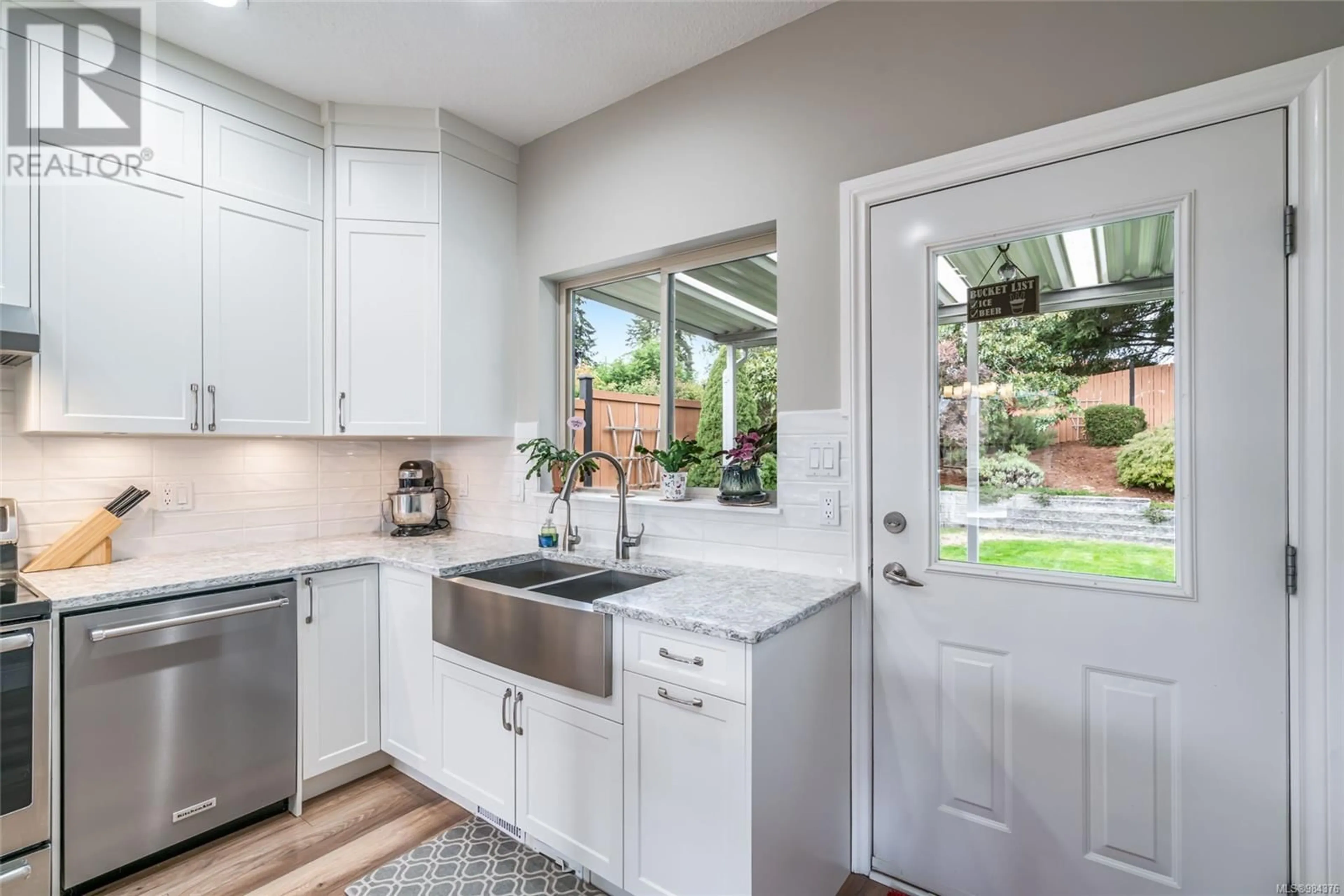 Contemporary kitchen, ceramic/tile floor for 6276 Garside Rd, Nanaimo British Columbia V9T6H9