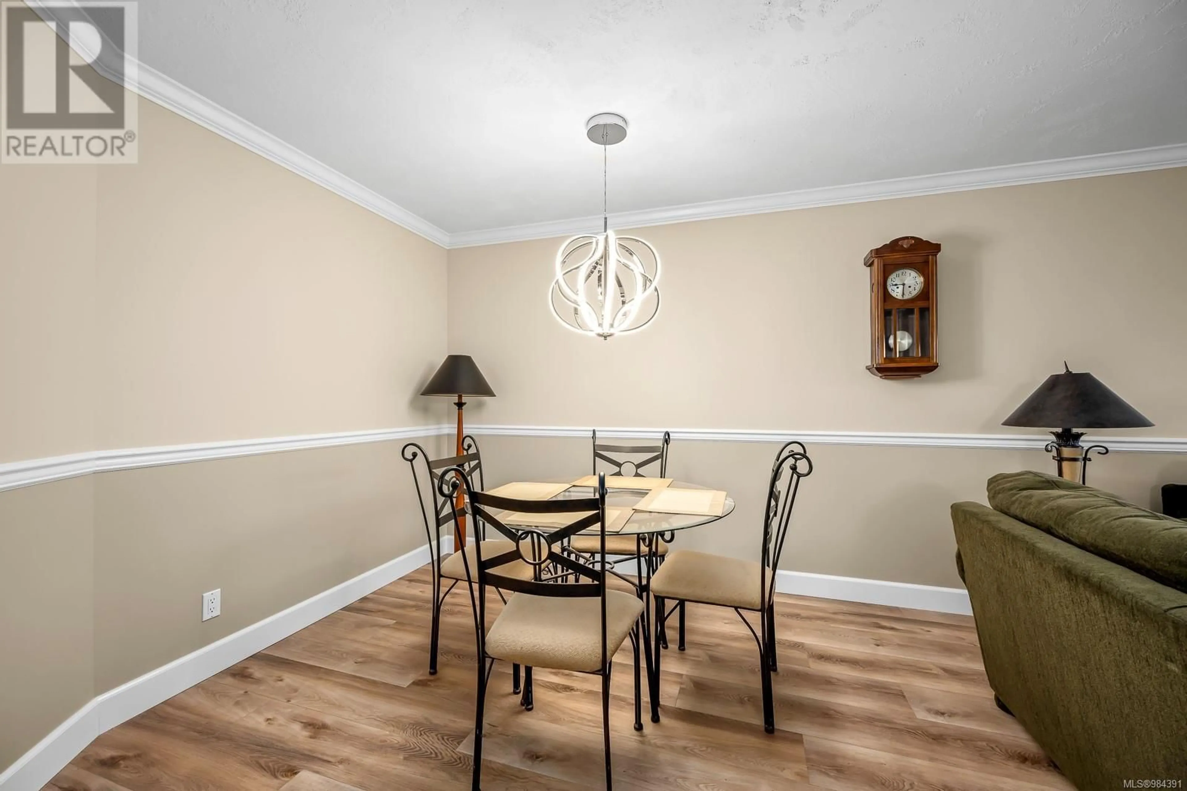 Dining room, wood/laminate floor for 8 3020 Cliffe Ave, Courtenay British Columbia V9N2L7