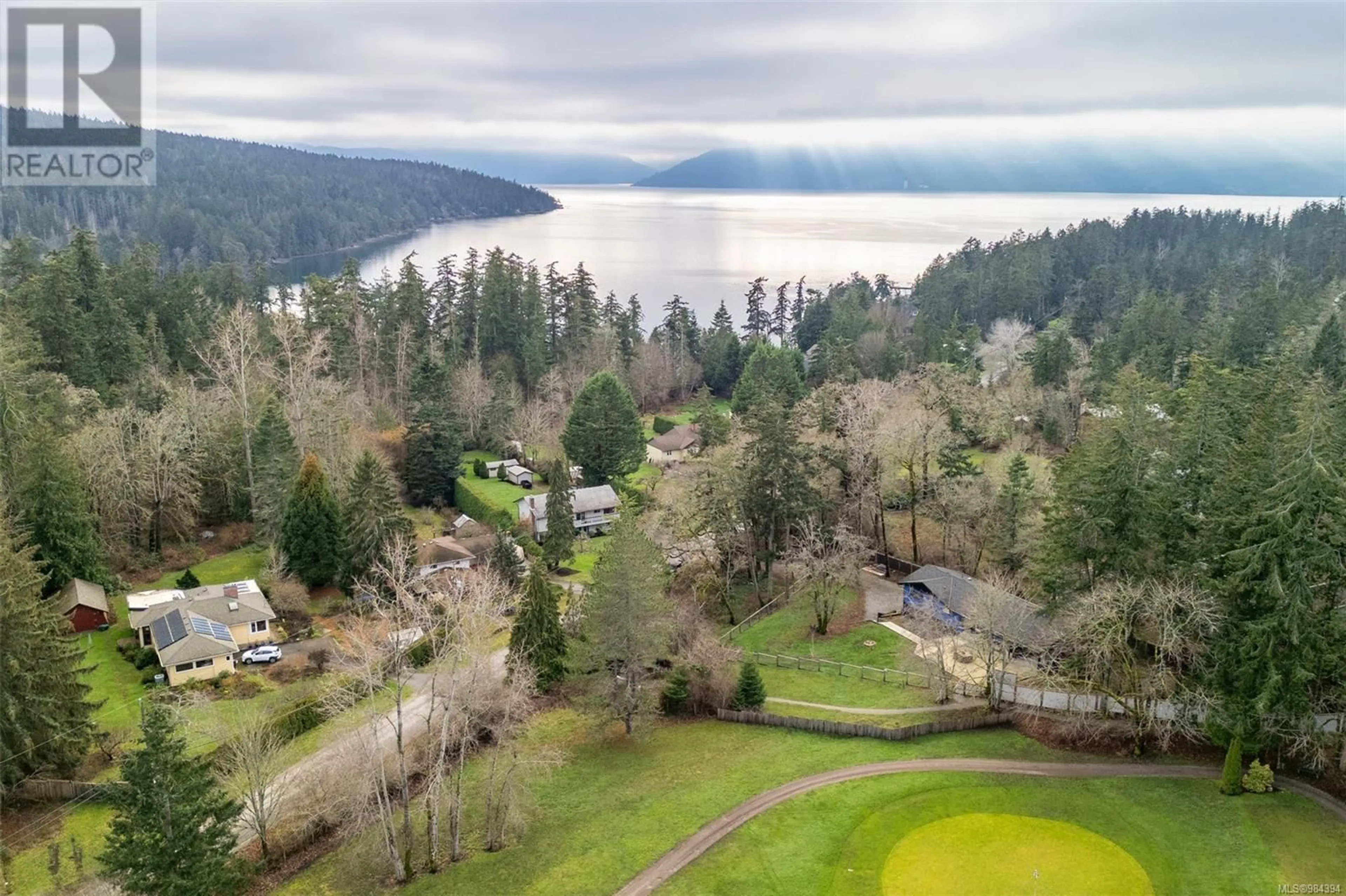 A pic from outside/outdoor area/front of a property/back of a property/a pic from drone, water/lake/river/ocean view for 814 Ardmore Dr, North Saanich British Columbia V8L5G2