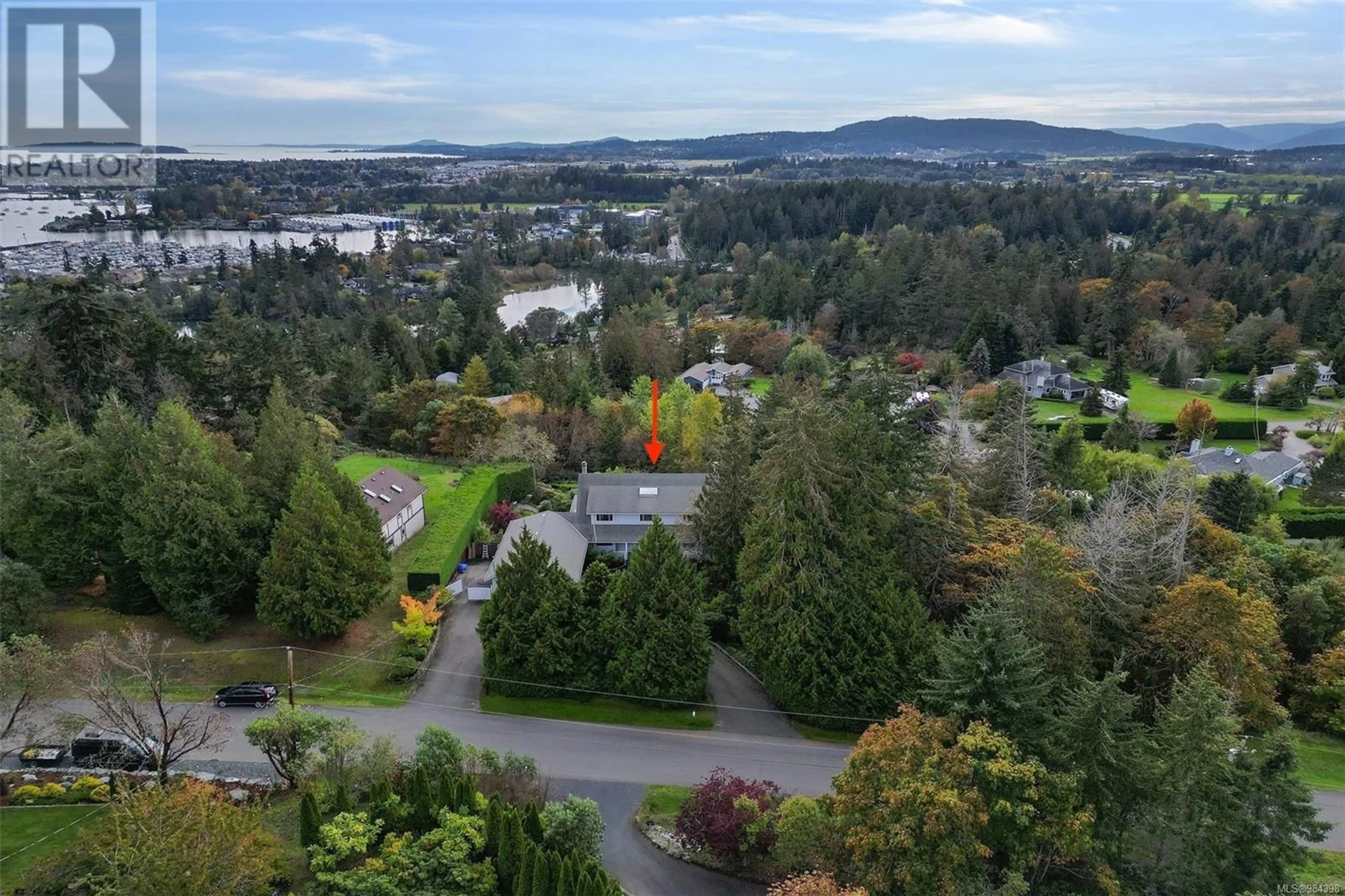 A pic from outside/outdoor area/front of a property/back of a property/a pic from drone, water/lake/river/ocean view for 10999 Oriole Lane, North Saanich British Columbia V8L5R1