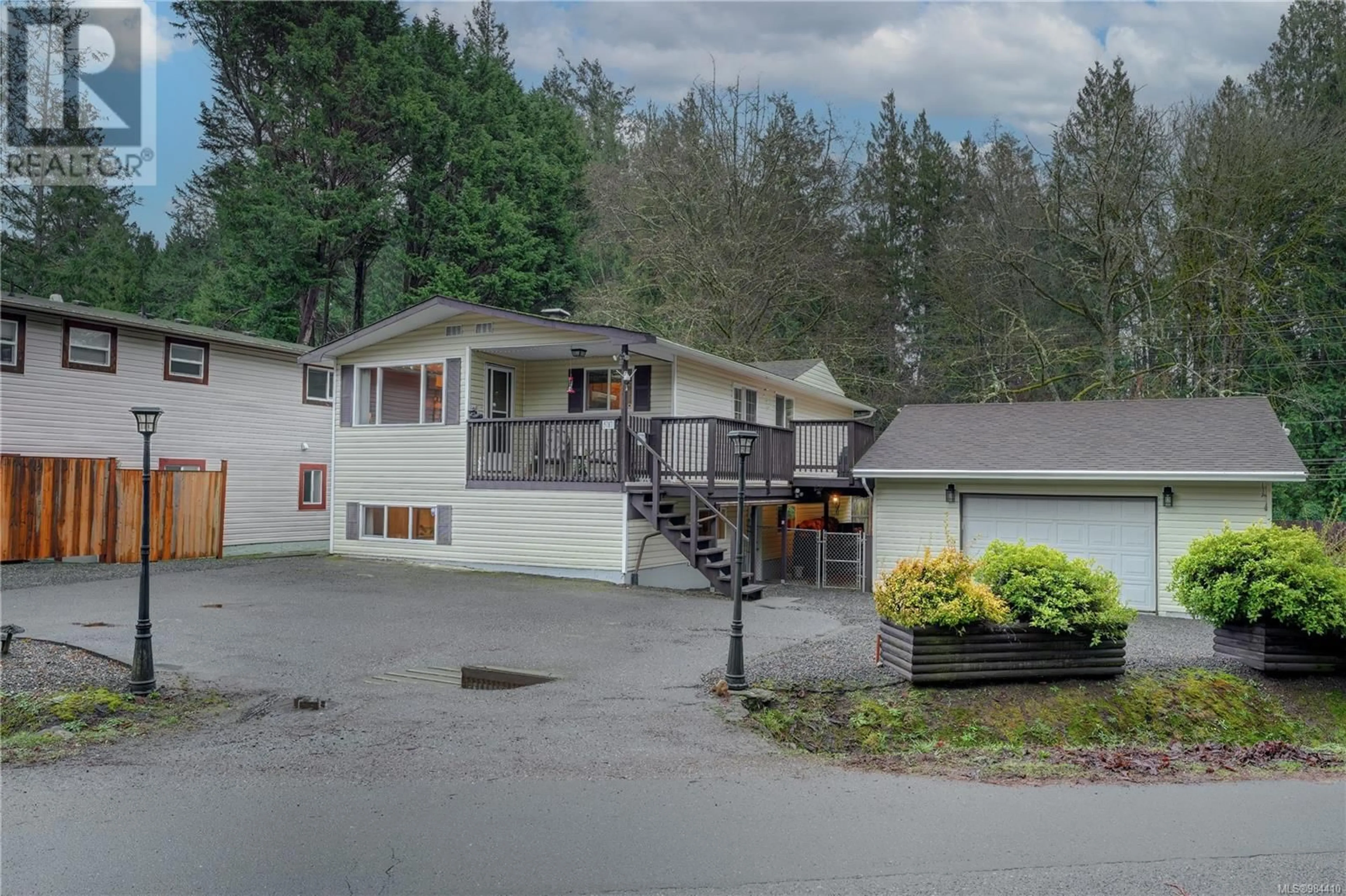 A pic from outside/outdoor area/front of a property/back of a property/a pic from drone, mountain view for 5787 Woodlands Rd, Sooke British Columbia V9Z0G4