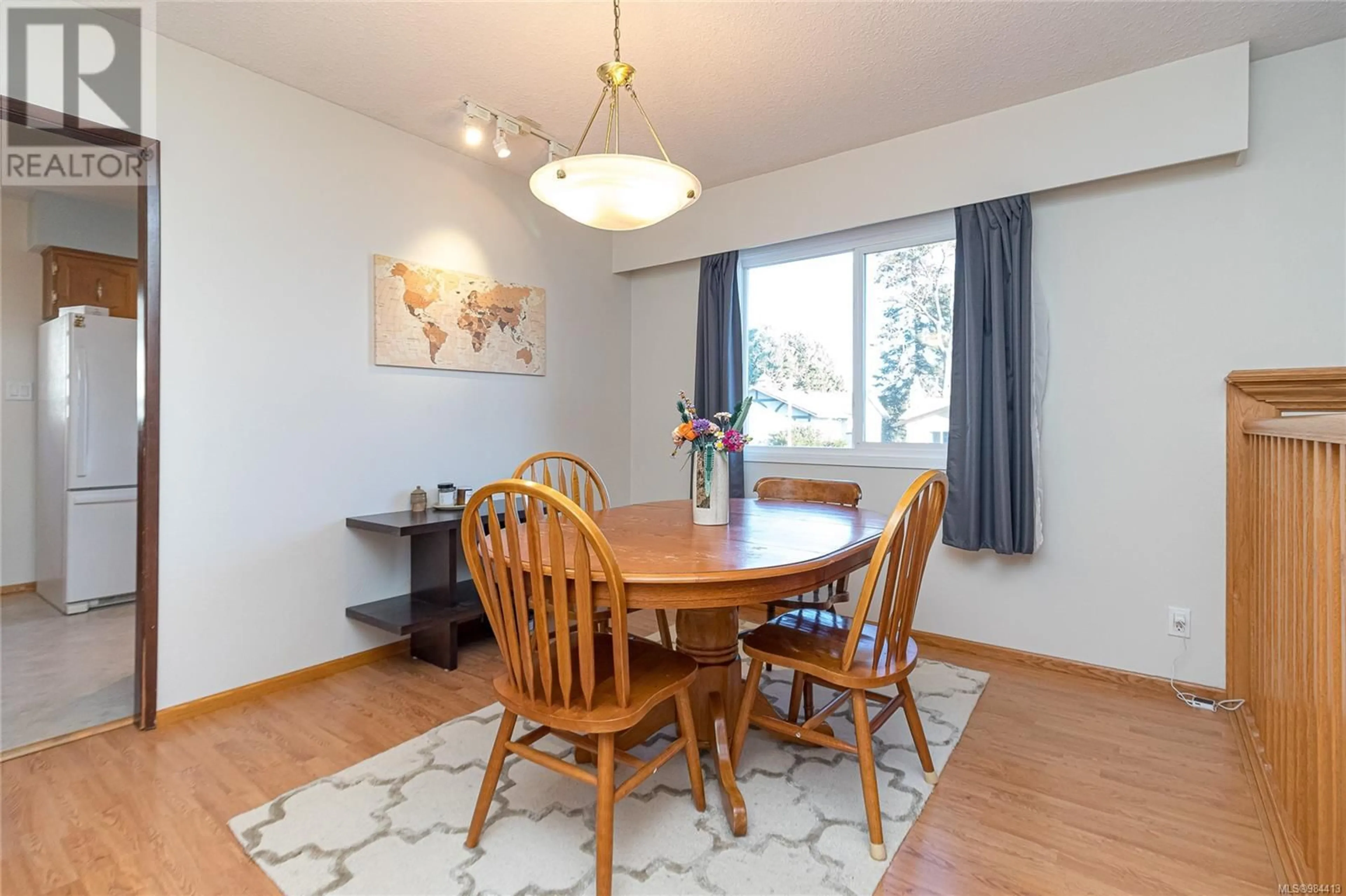 Dining room, wood/laminate floor for 4378 Fieldmont Pl, Saanich British Columbia V8N4Z3