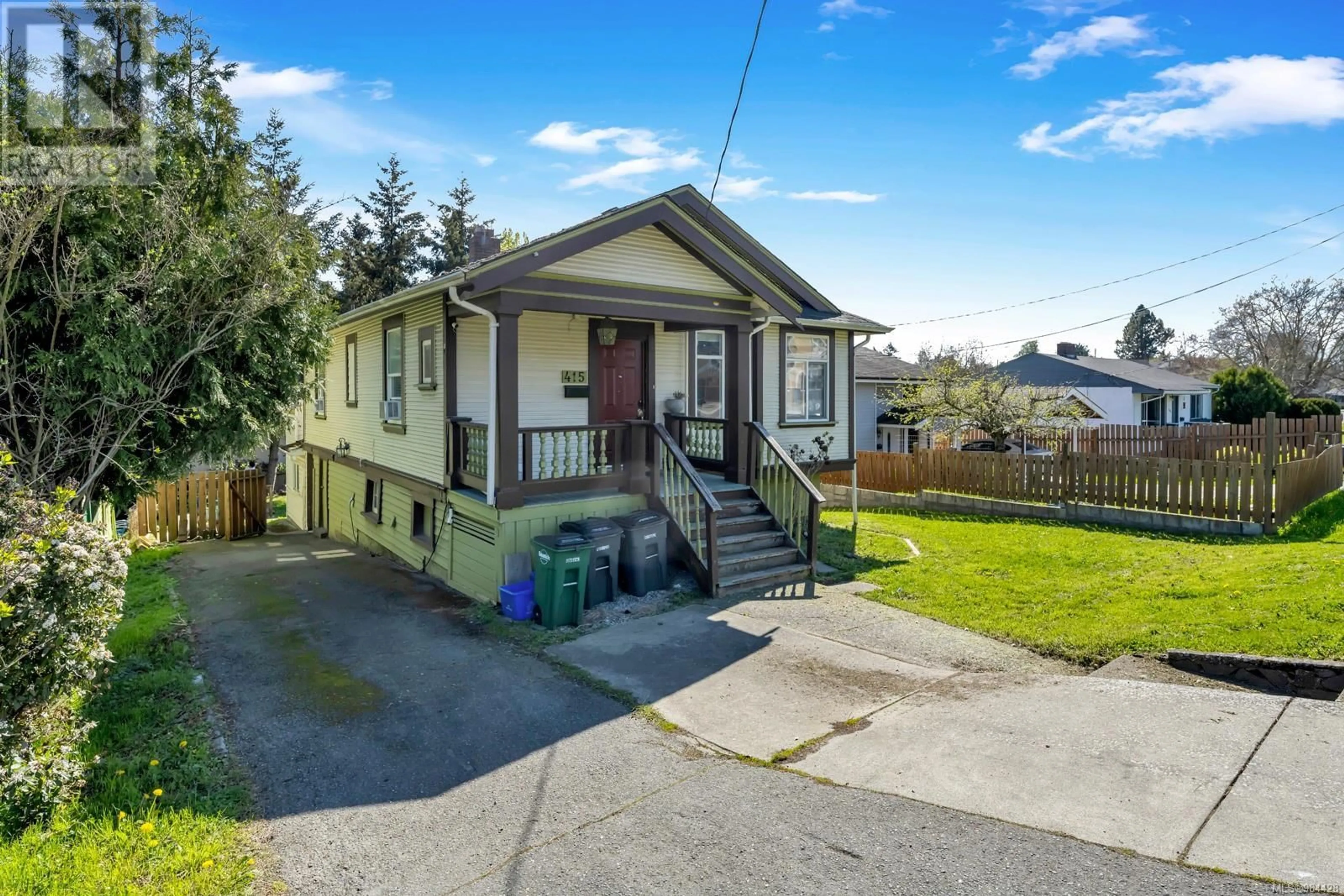 Home with vinyl exterior material, street for 415 Boleskine Rd, Saanich British Columbia V8Z1E5