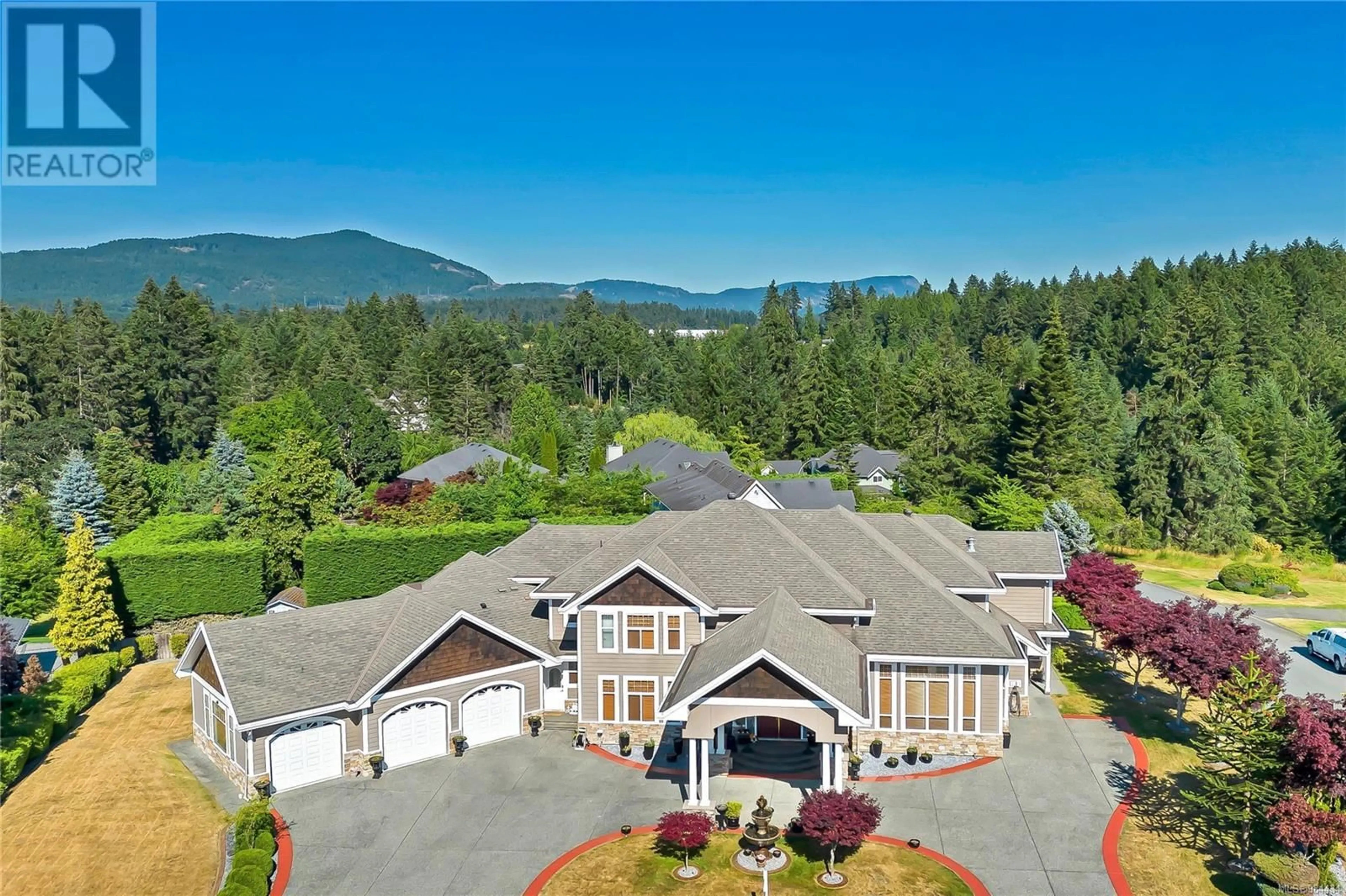 A pic from outside/outdoor area/front of a property/back of a property/a pic from drone, mountain view for 6797 HAMPTON PLACE, Duncan British Columbia V9L6X7