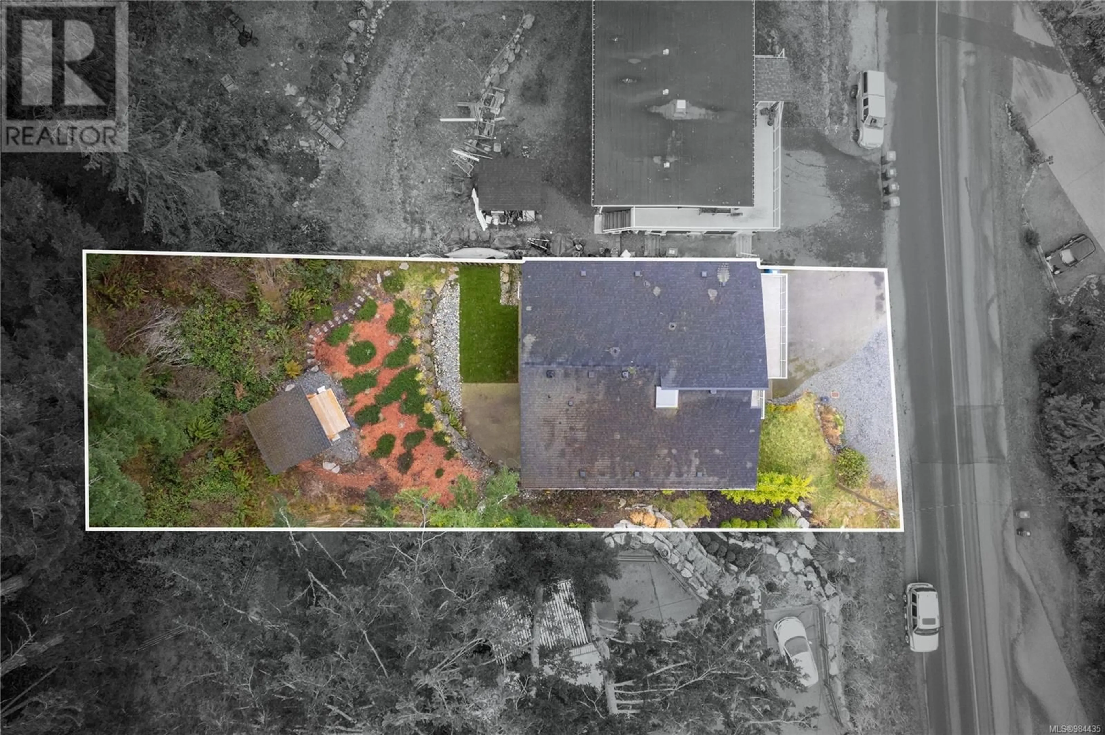 A pic from outside/outdoor area/front of a property/back of a property/a pic from drone, street for 5043 Lost Lake Rd, Nanaimo British Columbia V9T5E3