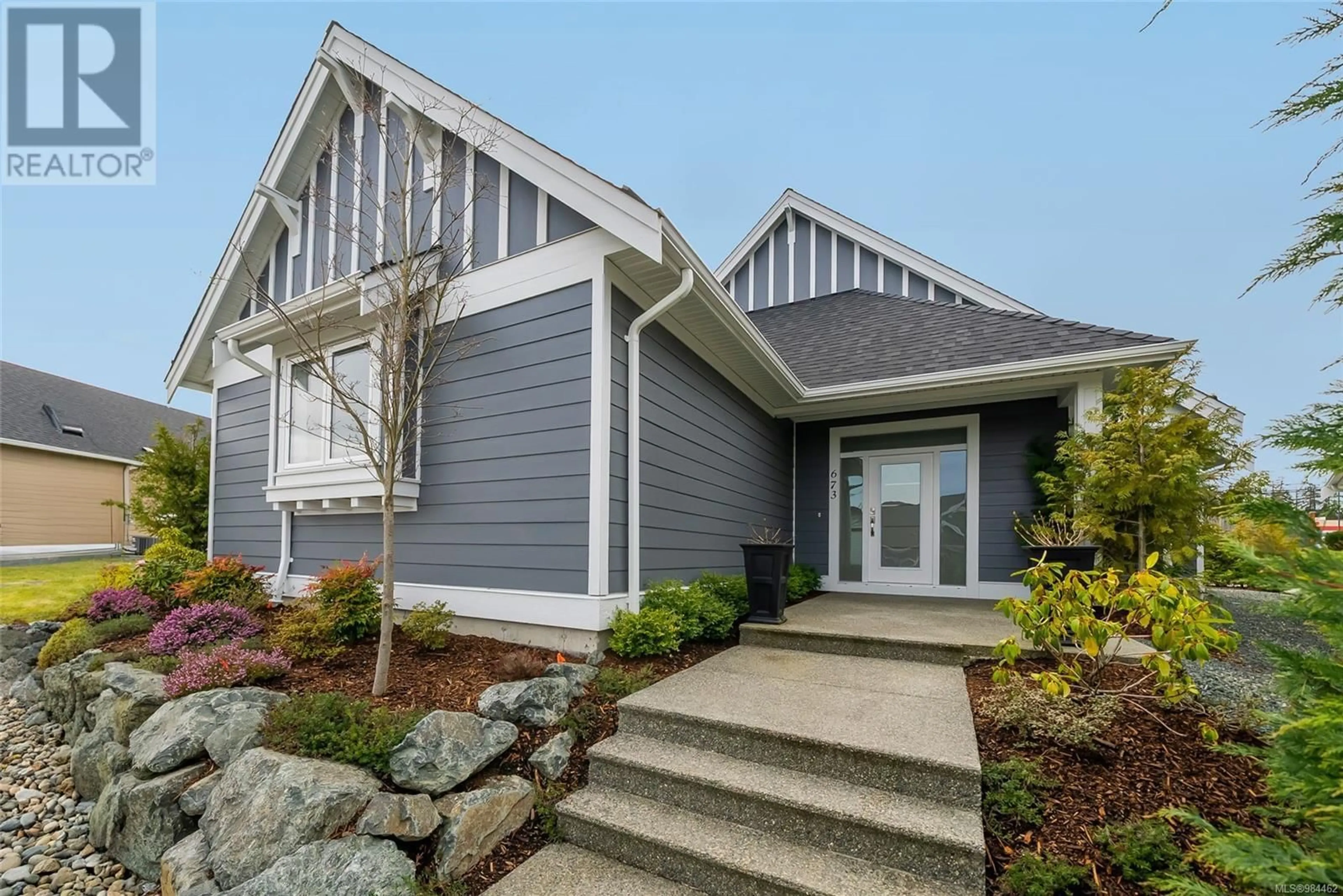Home with vinyl exterior material, street for 673 BRIARWOOD DRIVE, Parksville British Columbia V9P0G5