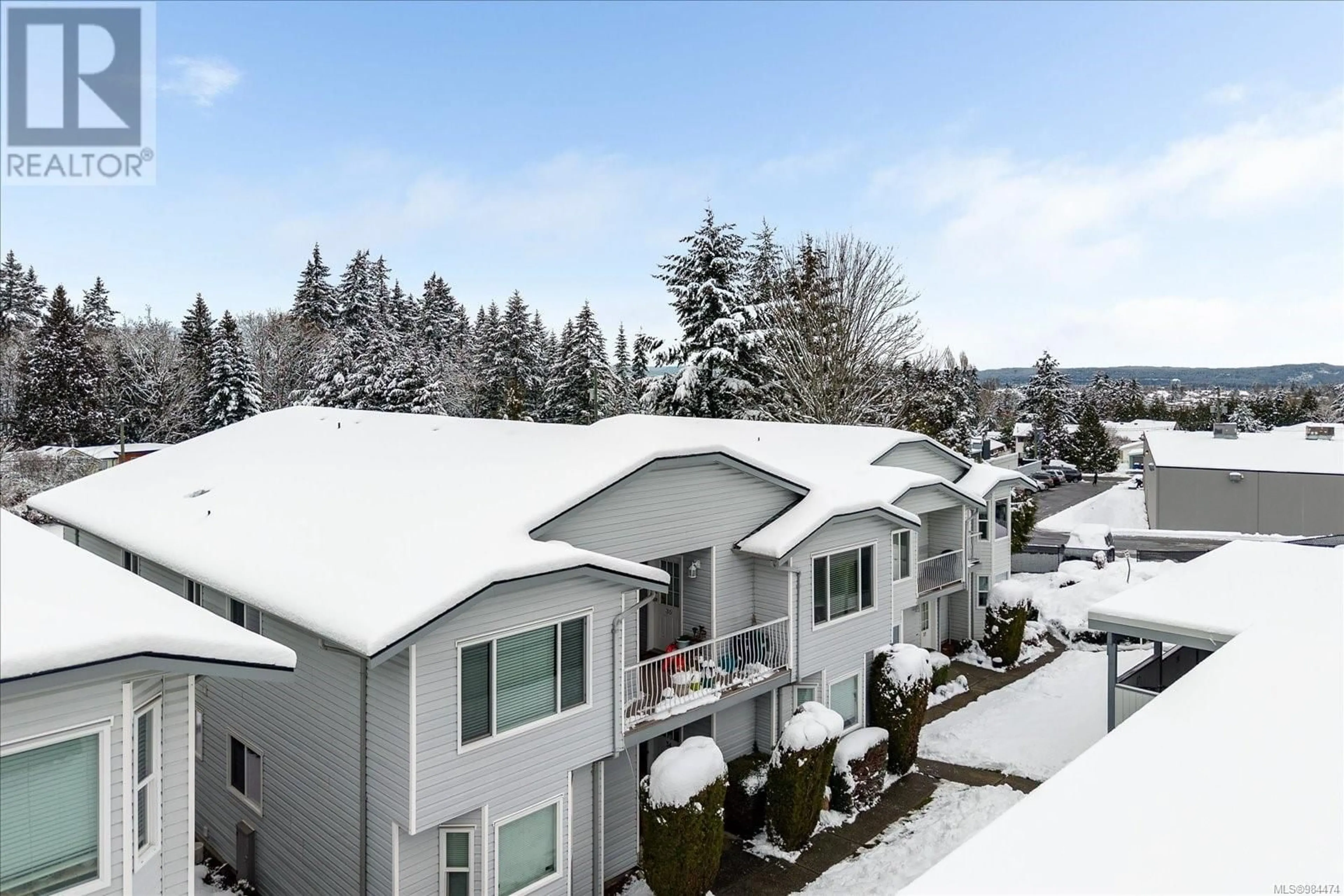 A pic from outside/outdoor area/front of a property/back of a property/a pic from drone, mountain view for 35 262 Harwell Rd, Nanaimo British Columbia V9R6V1