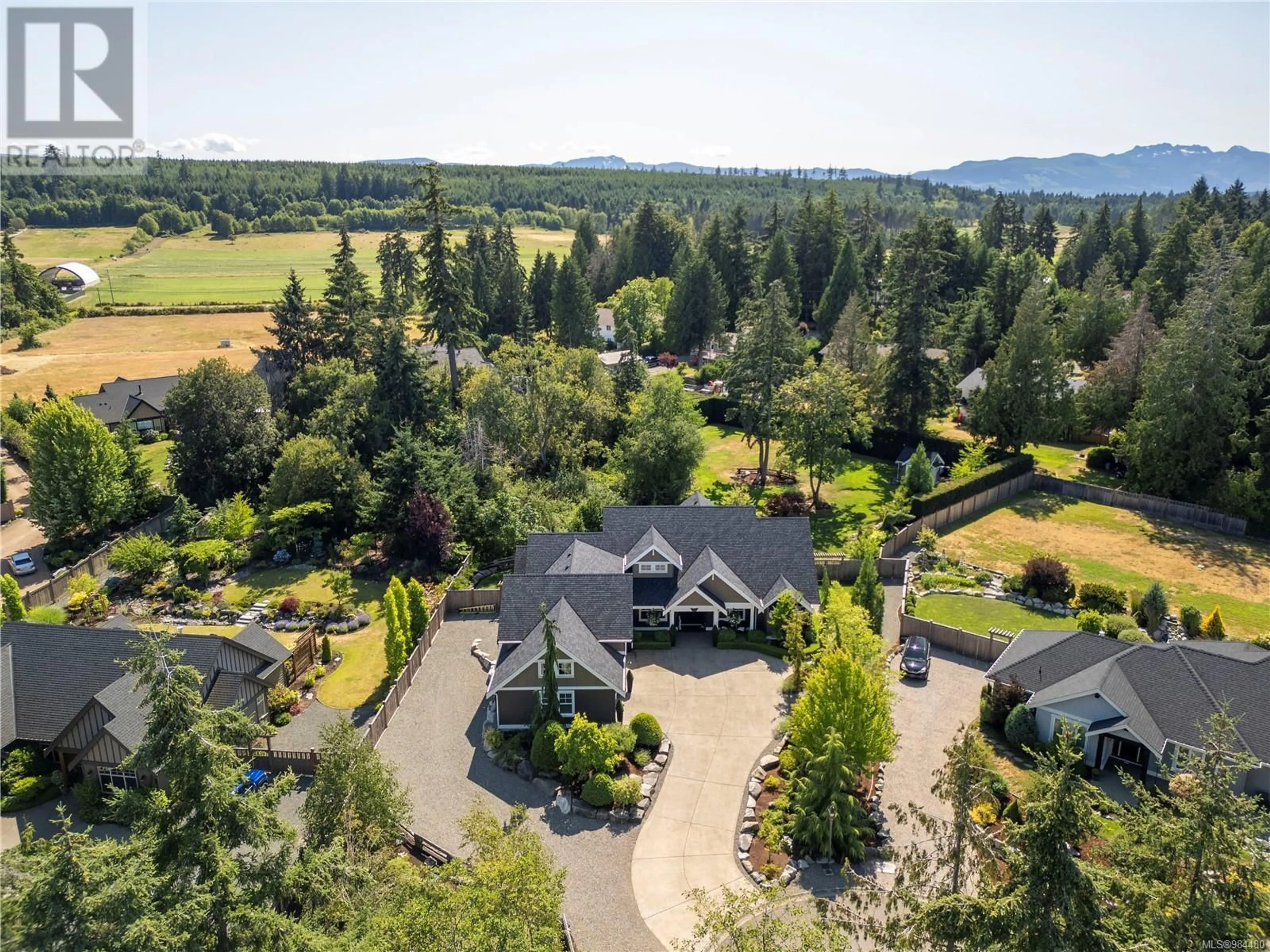 A pic from outside/outdoor area/front of a property/back of a property/a pic from drone, mountain view for 1691 Sanctuary Dr, Nanoose Bay British Columbia V9P9C6