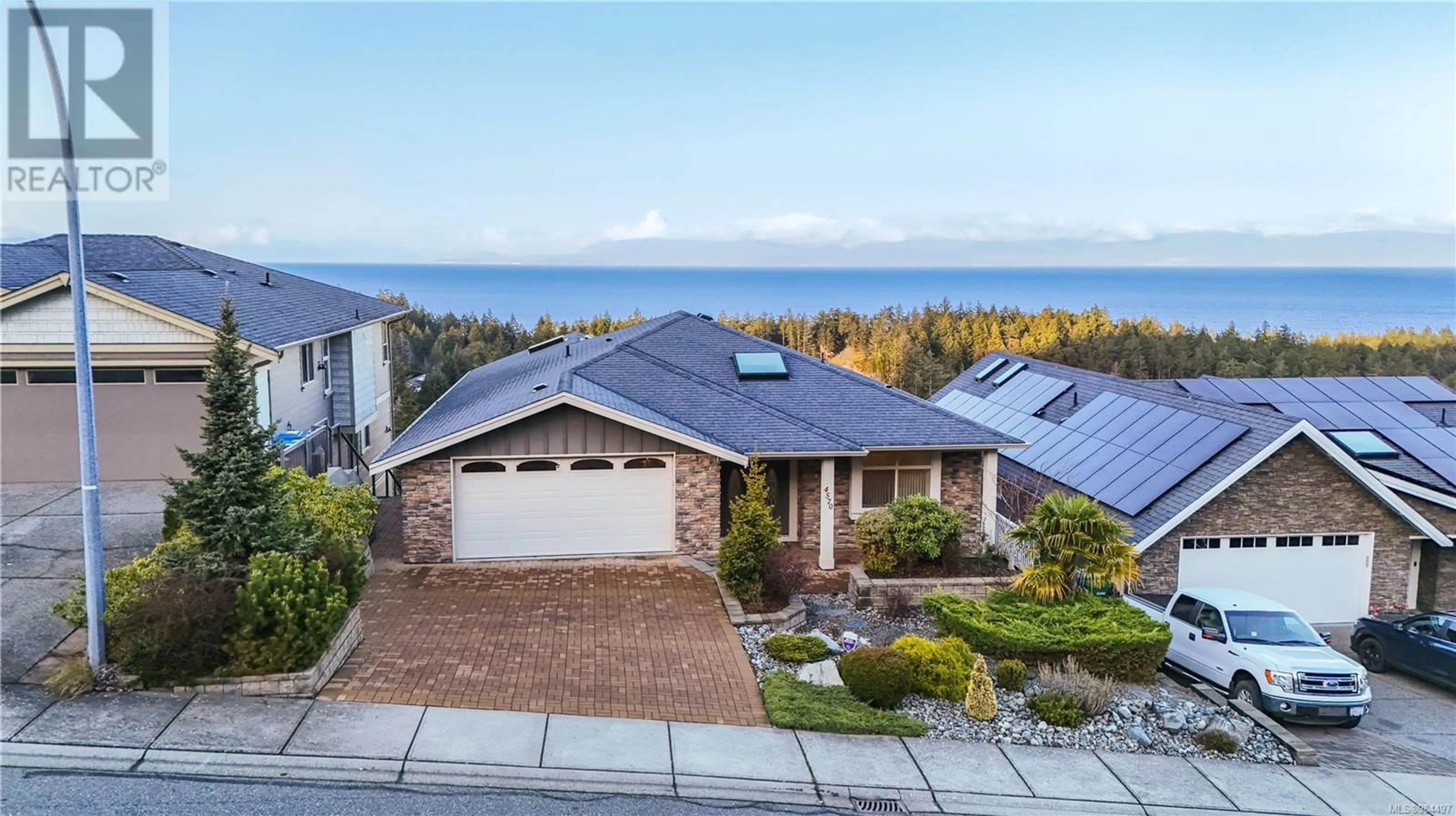 A pic from outside/outdoor area/front of a property/back of a property/a pic from drone, water/lake/river/ocean view for 4570 Laguna Way, Nanaimo British Columbia V9T0A8