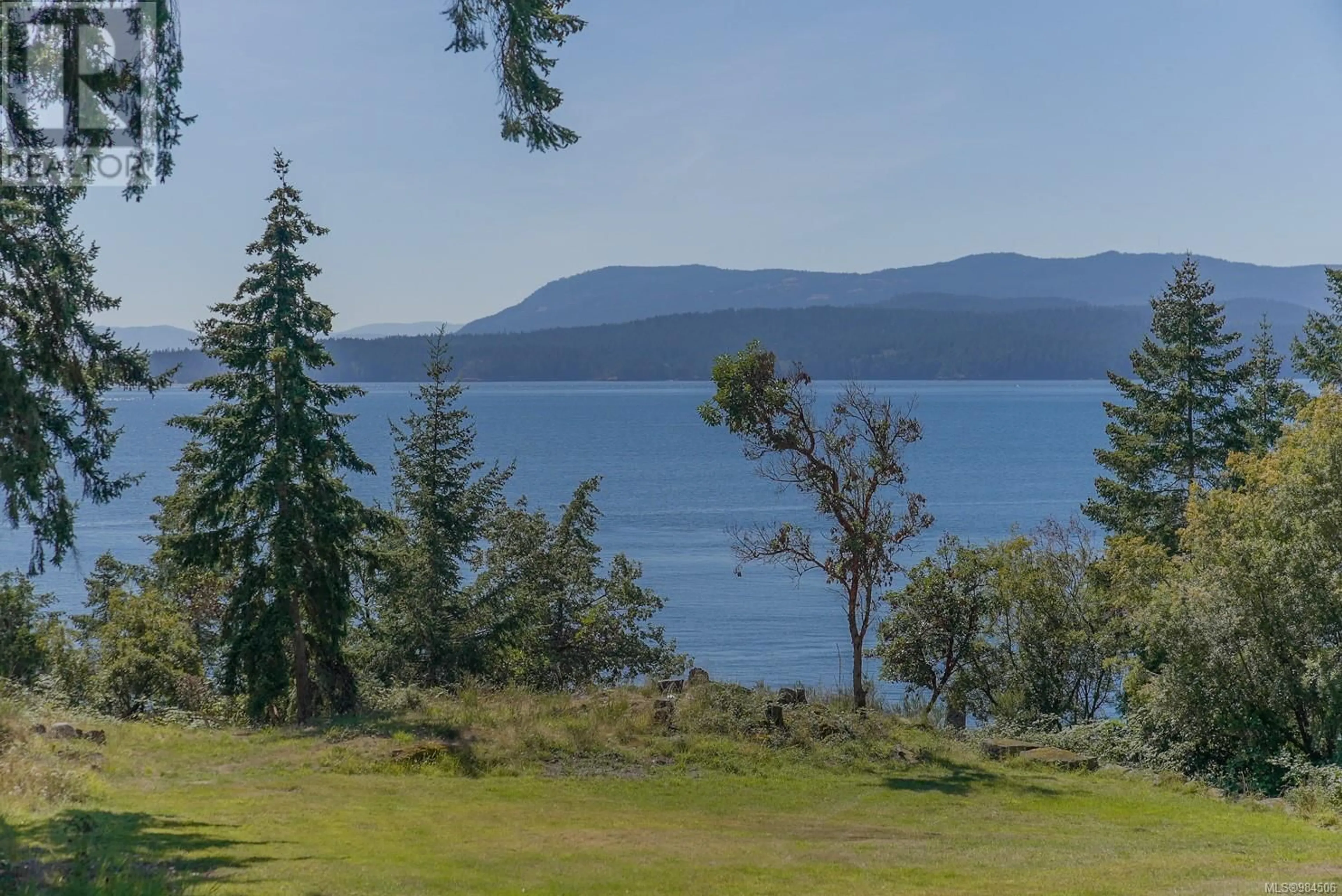 A pic from outside/outdoor area/front of a property/back of a property/a pic from drone, water/lake/river/ocean view for 1325 Mackinnon Rd, Pender Island British Columbia V0N2M1