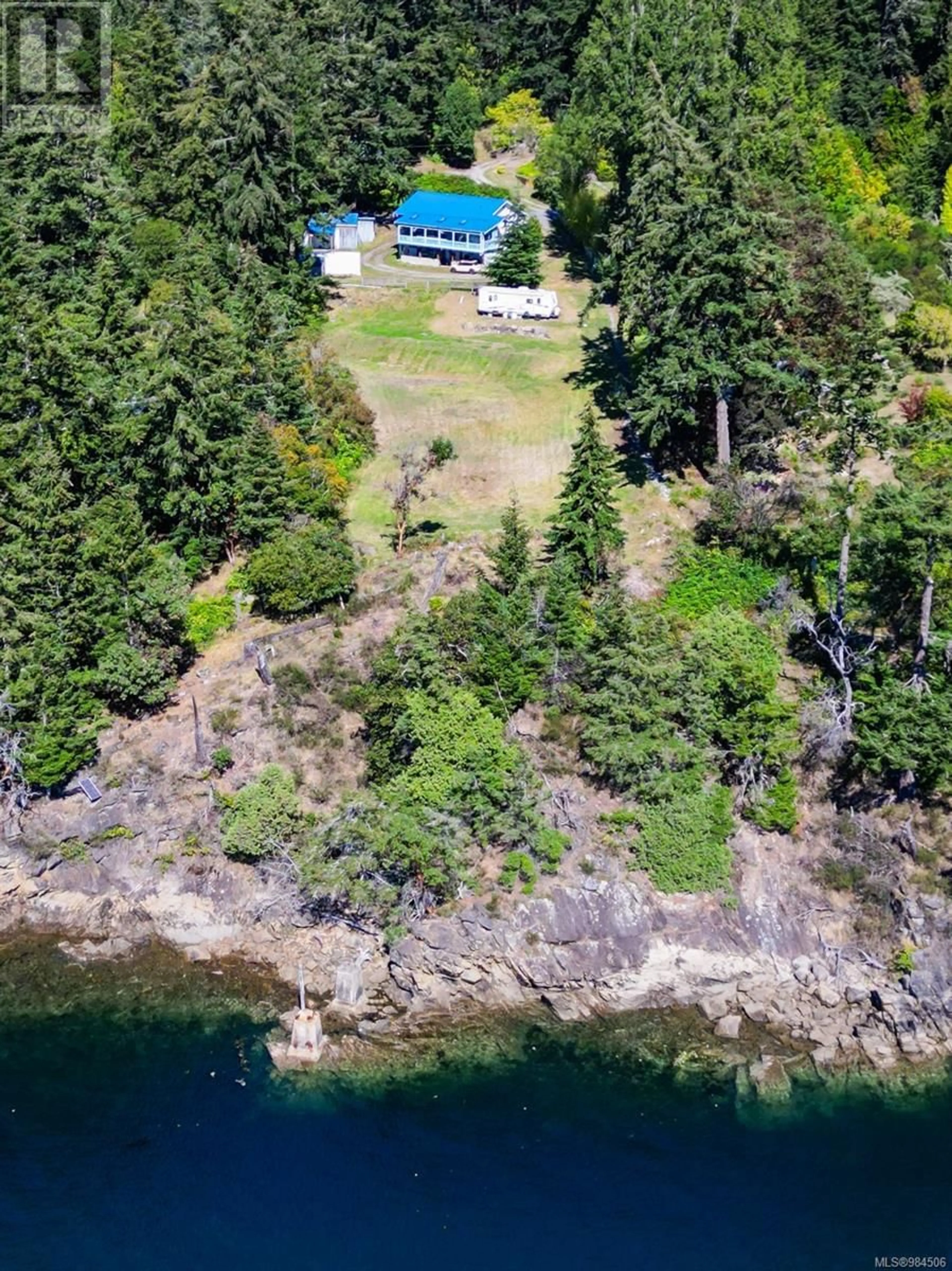 A pic from outside/outdoor area/front of a property/back of a property/a pic from drone, water/lake/river/ocean view for 1325 Mackinnon Rd, Pender Island British Columbia V0N2M1