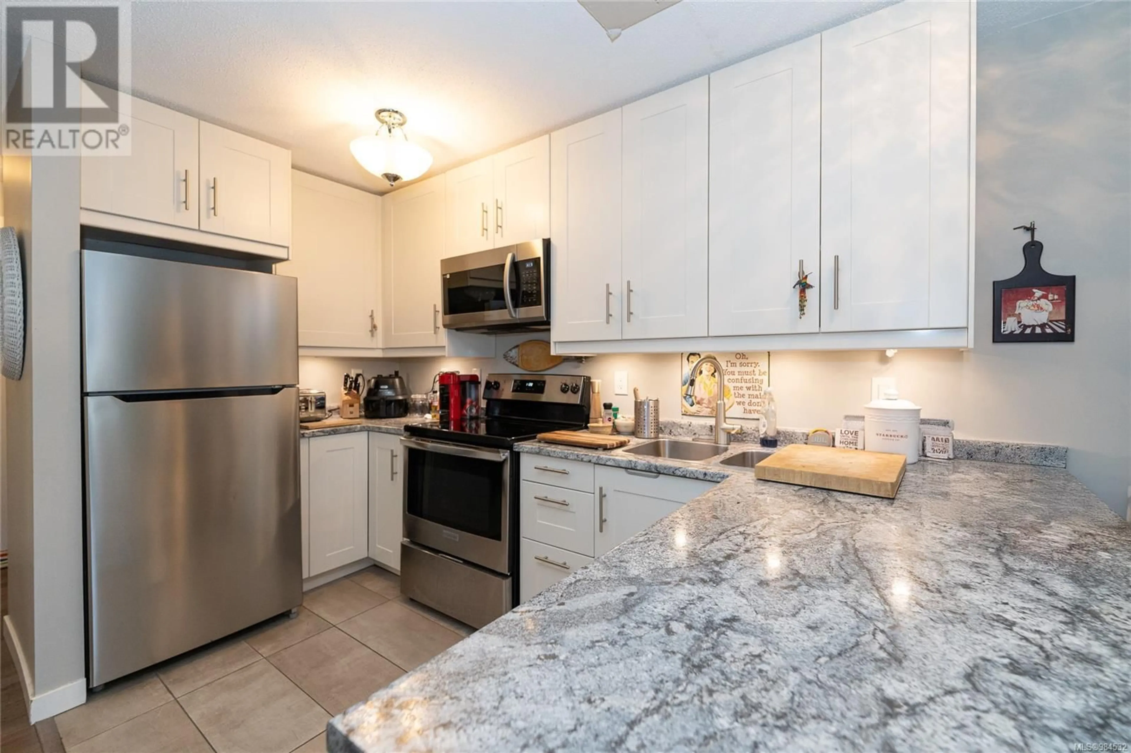 Standard kitchen, ceramic/tile floor for 117 3215 Cowichan Lake Rd, Duncan British Columbia V9L5G5