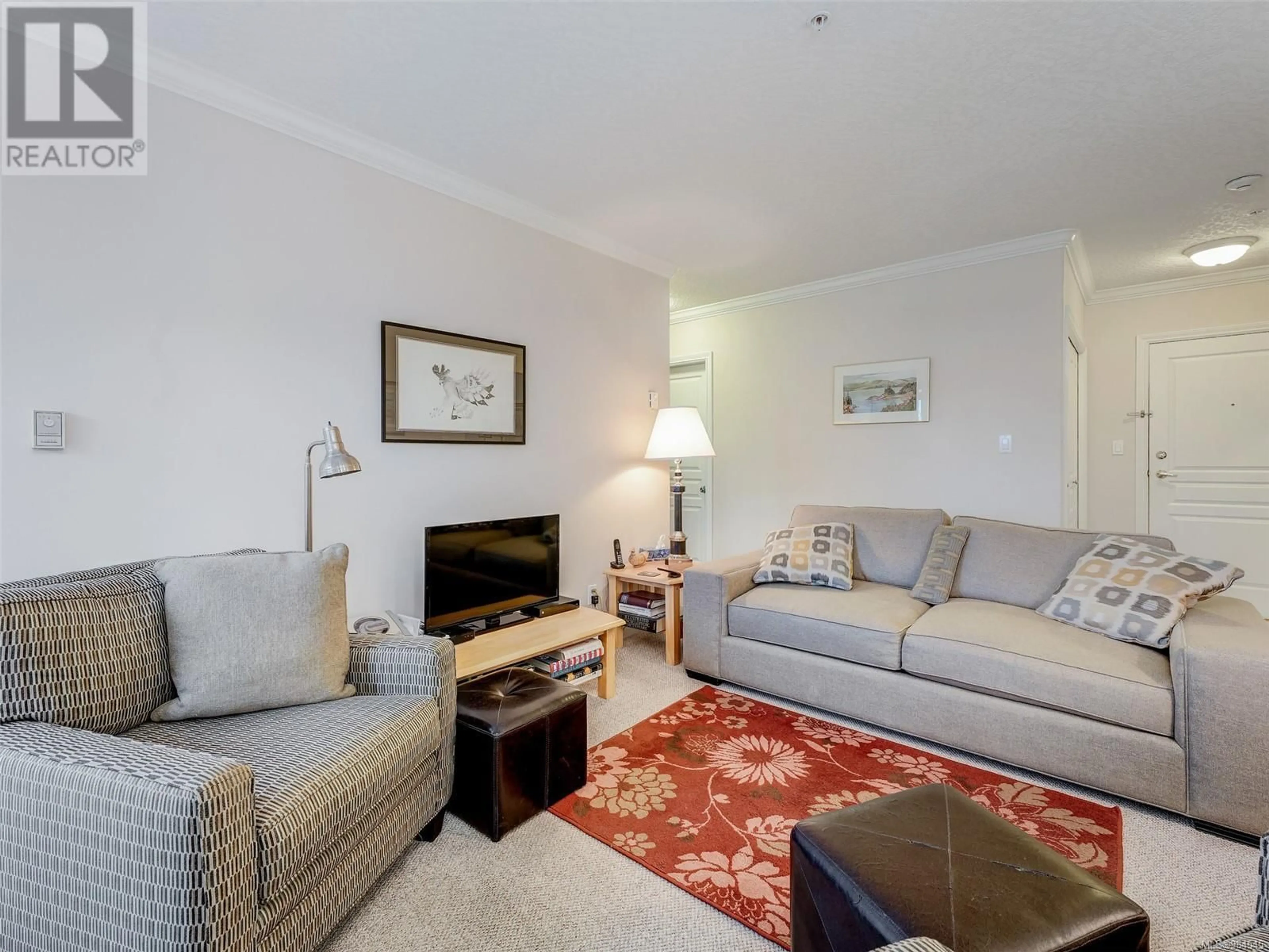 Living room with furniture, carpet floor for 302 405 QUEBEC St, Victoria British Columbia V8V4Z2