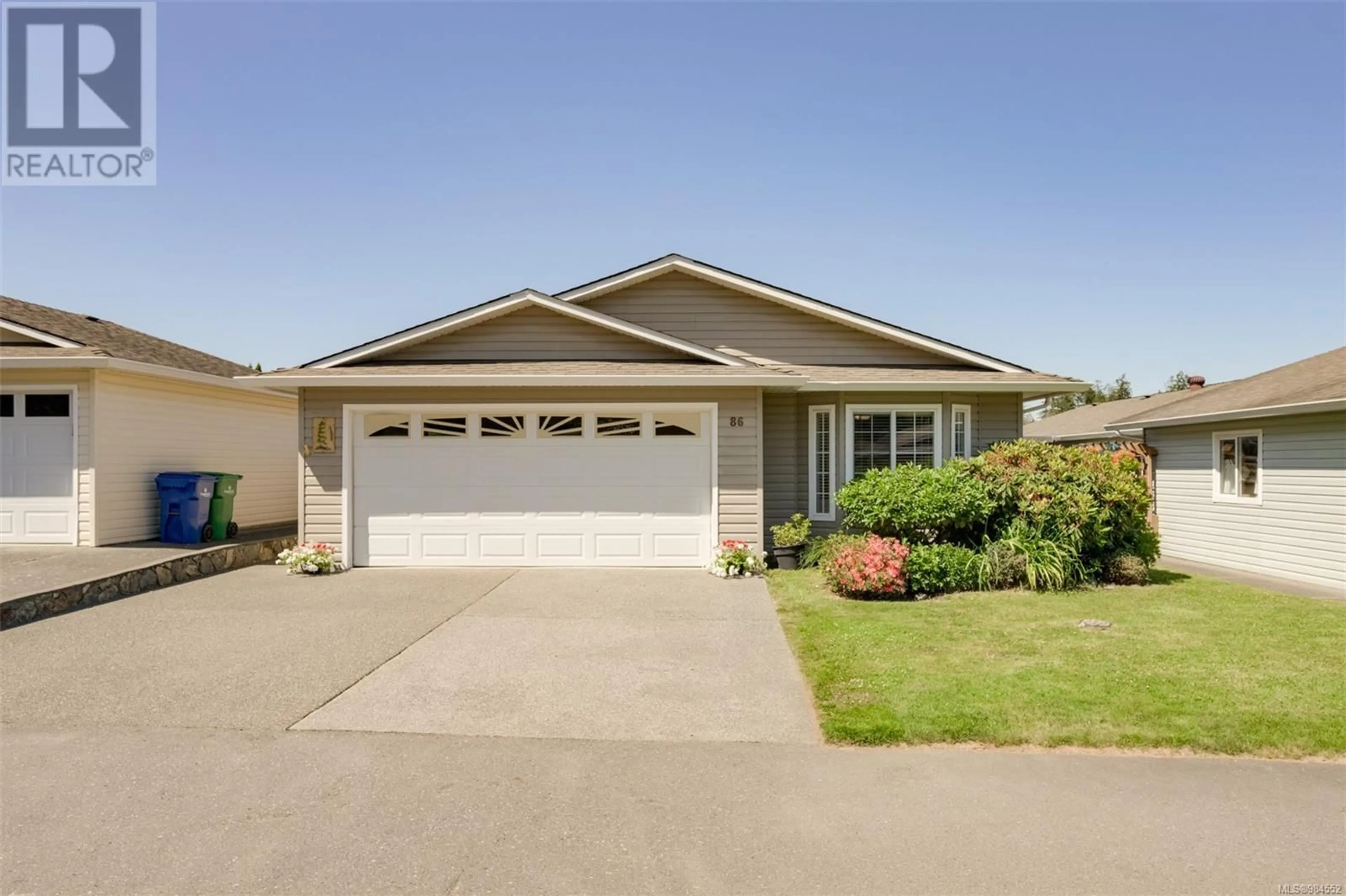 Home with vinyl exterior material, street for 86 7570 Tetayut Rd, Central Saanich British Columbia V8M2H4