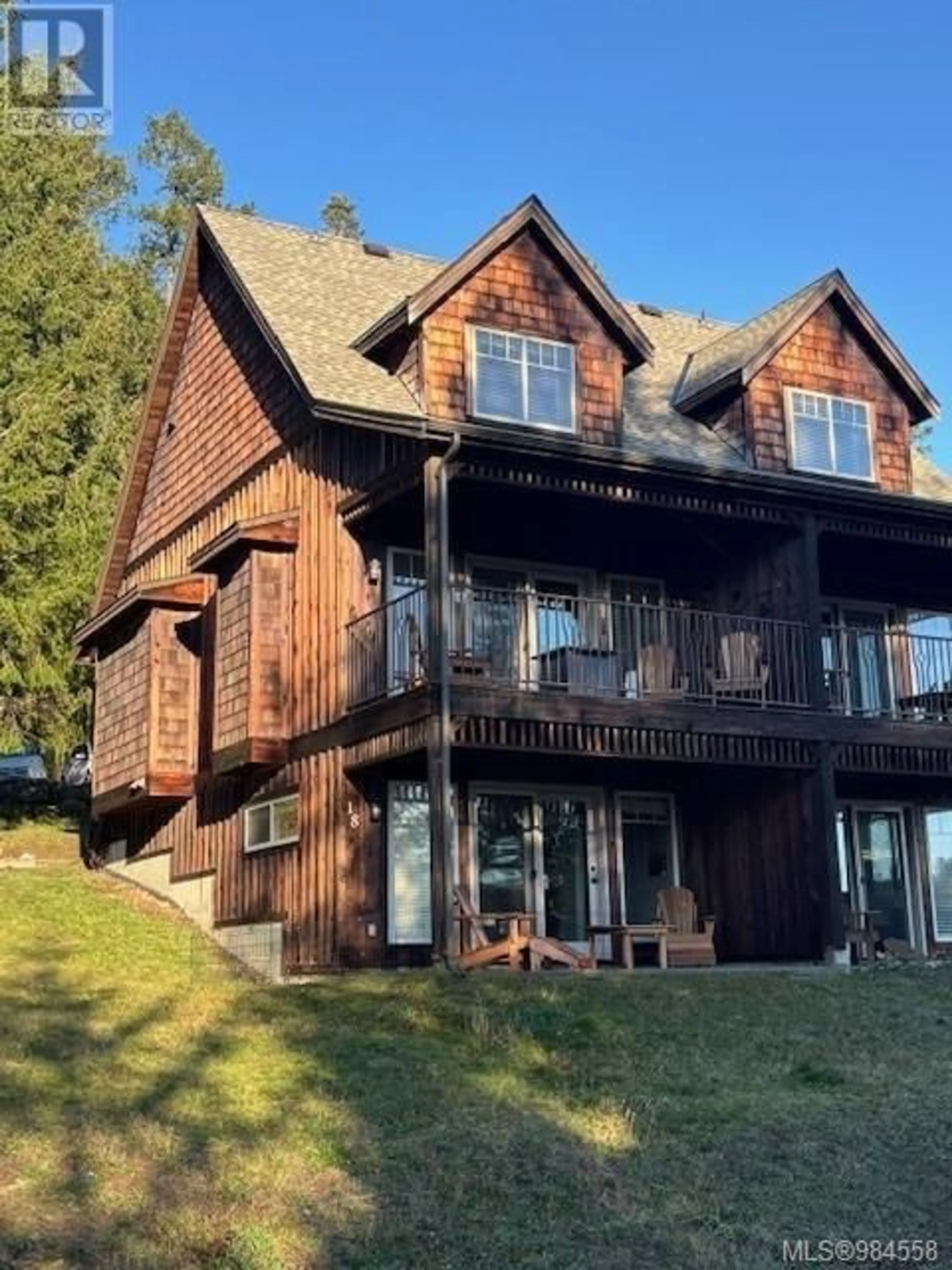 A pic from outside/outdoor area/front of a property/back of a property/a pic from drone, unknown for 18 315 Robinson Rd, Salt Spring British Columbia V8K1P7